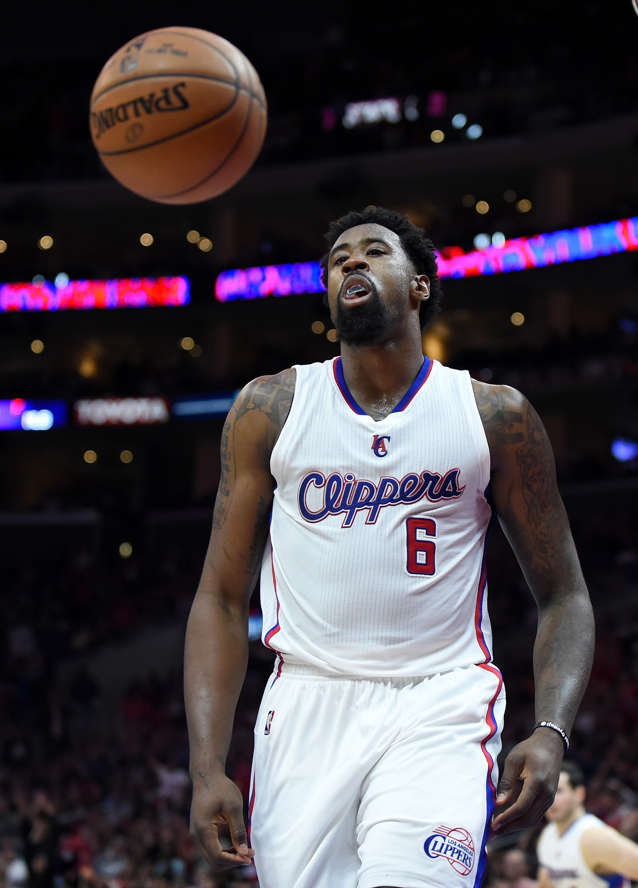 LOS ANGELES, CA - APRIL 13:  DeAndre Jordan #6 of the Los Angeles Clippers reacts after his dunk during a 110-103 win over the Denver Nuggets at Staples Center on April 13, 2015 in Los Angeles, California.  NOTE TO USER: User expressly acknowledges and agrees that, by downloading and or using this Photograph, user is consenting to the terms and condition of the Getty Images License Agreement.  (Photo by Harry How/Getty Images)
