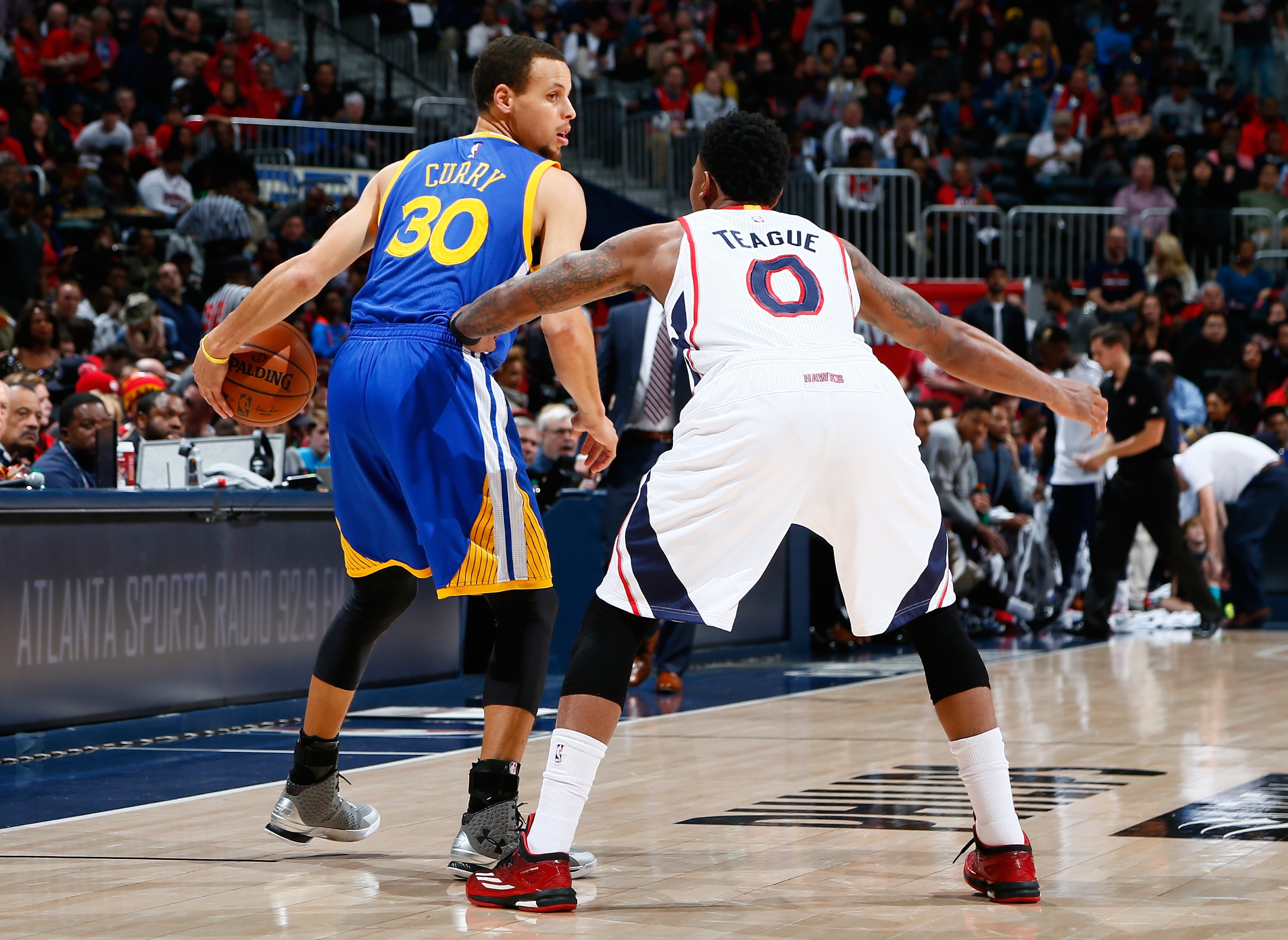 Can Jeff Teague and company take away Stephen Curry's room to operate? (Kevin C. Cox/Getty Images)