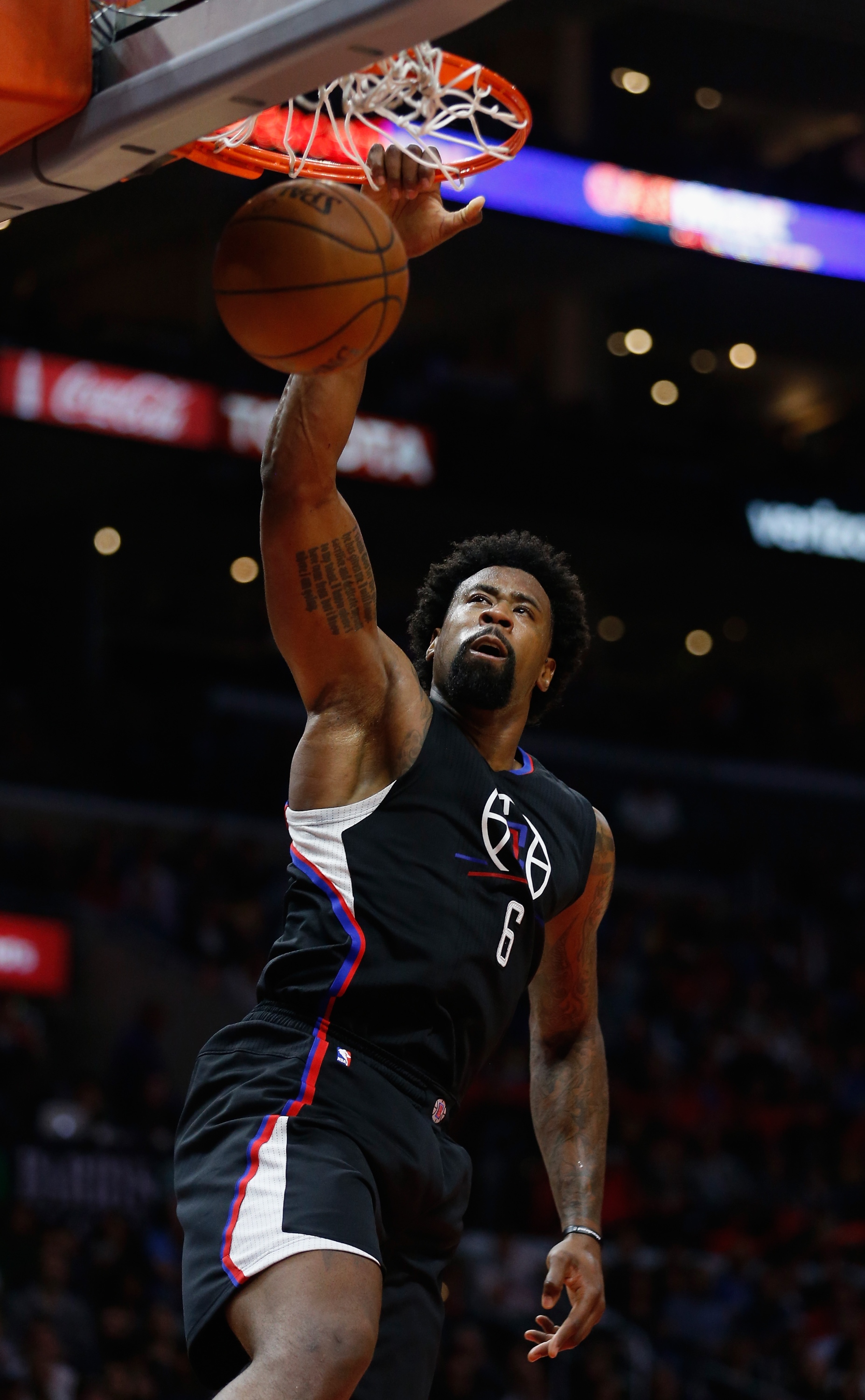 DeAndre Jordan practices his right-handed free throws. (Sean M. Haffey/Getty Images)