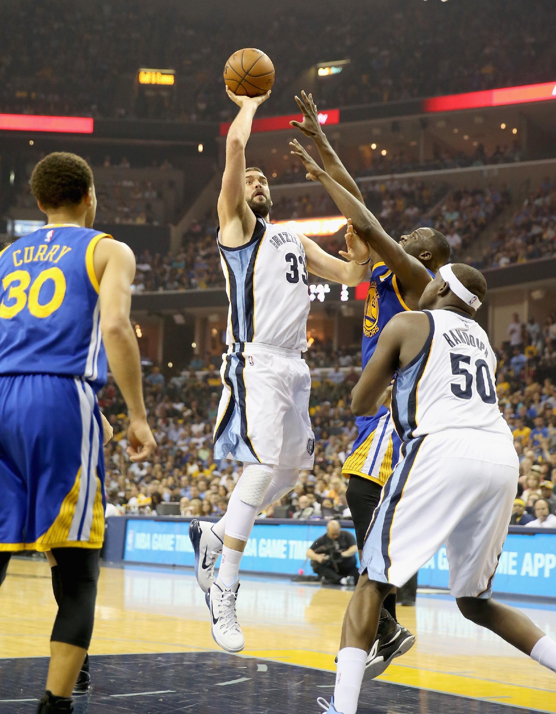 MEMPHIS, TN - MAY 09:  Marc Gasol #33 of the Memphis Grizzliesshoots the ball against the Golden State Warriors during Game three of the Western Conference Semifinals of the 2015 NBA Playoffs at FedExForum on May 9, 2015 in Memphis, Tennessee. NOTE TO USER: User expressly acknowledges and agrees that, by downloading and or using this photograph, User is consenting to the terms and conditions of the Getty Images License Agreement  (Photo by Andy Lyons/Getty Images)