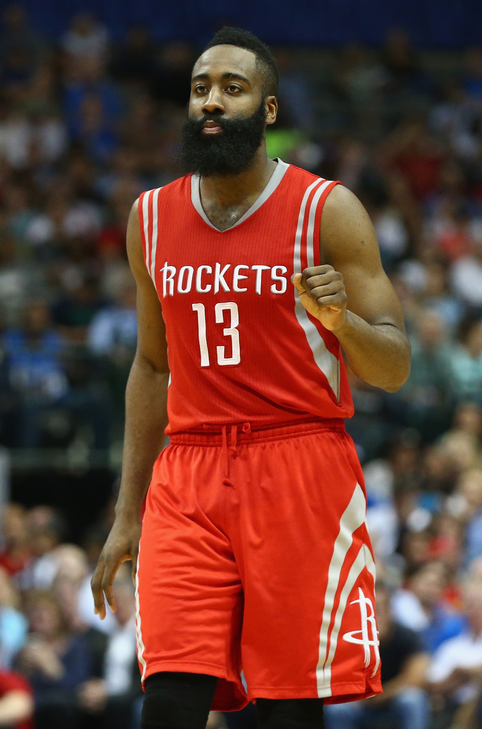 DALLAS, TX - APRIL 02: James Harden #13 of the Houston Rockets reacts during play against the Dallas Mavericks at American Airlines Center on April 2, 2015 in Dallas, Texas. NOTE TO USER: User expressly acknowledges and agrees that, by downloading and or using this photograph, User is consenting to the terms and conditions of the Getty Images License Agreement. (Photo by Ronald Martinez/Getty Images)