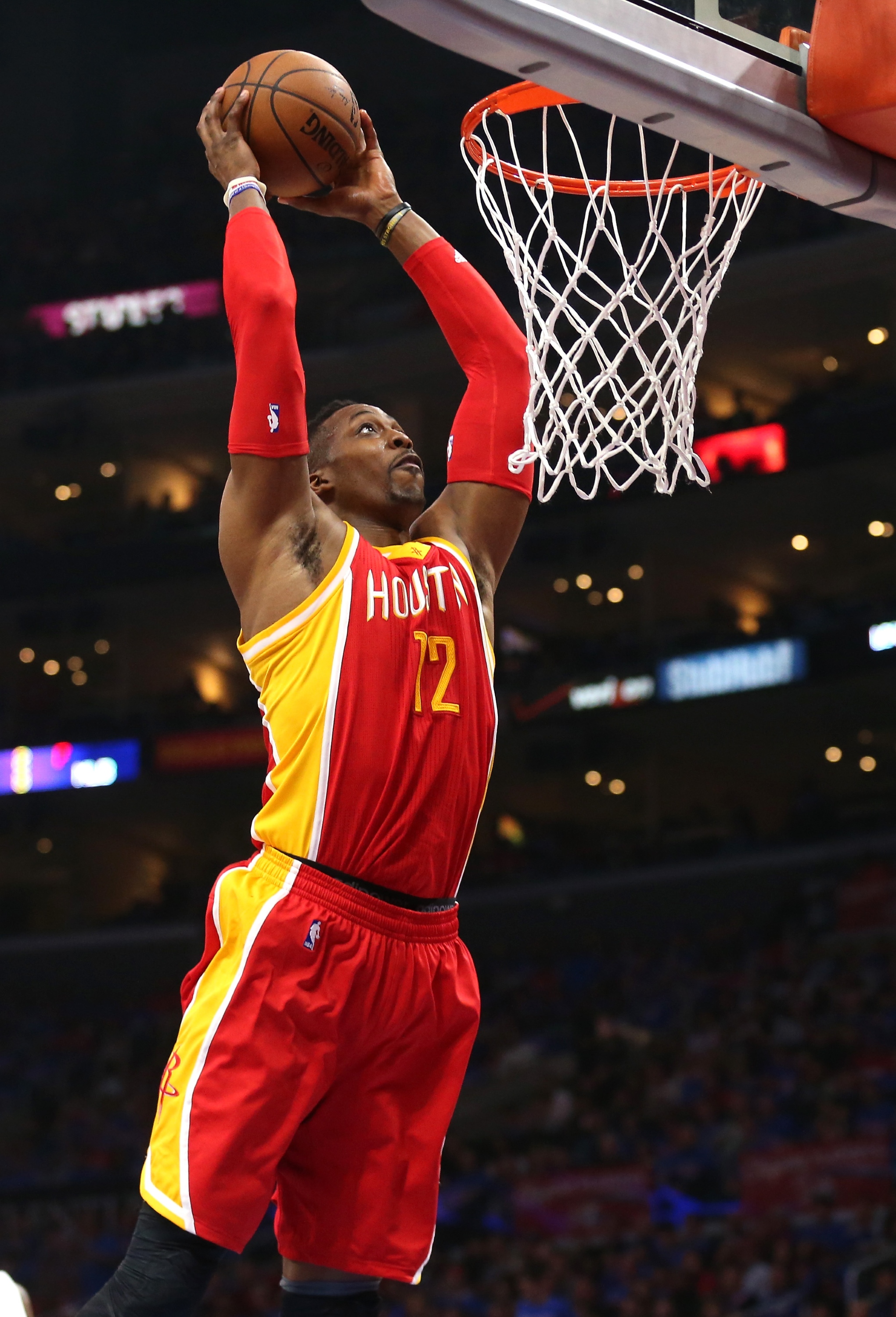 LOS ANGELES, CA - MAY 10:  Dwight Howard #12 of the Houston Rockets dunks against the Los Angeles Clippers during Game Four of the Western Conference semifinals of the 2015 NBA Playoffs at Staples Center on May 10, 2015 in Los Angeles, California.  NOTE TO USER: User expressly acknowledges and agrees that, by downloading and or using this photograph, User is consenting to the terms and conditions of the Getty Images License Agreement.  (Photo by Stephen Dunn/Getty Images)