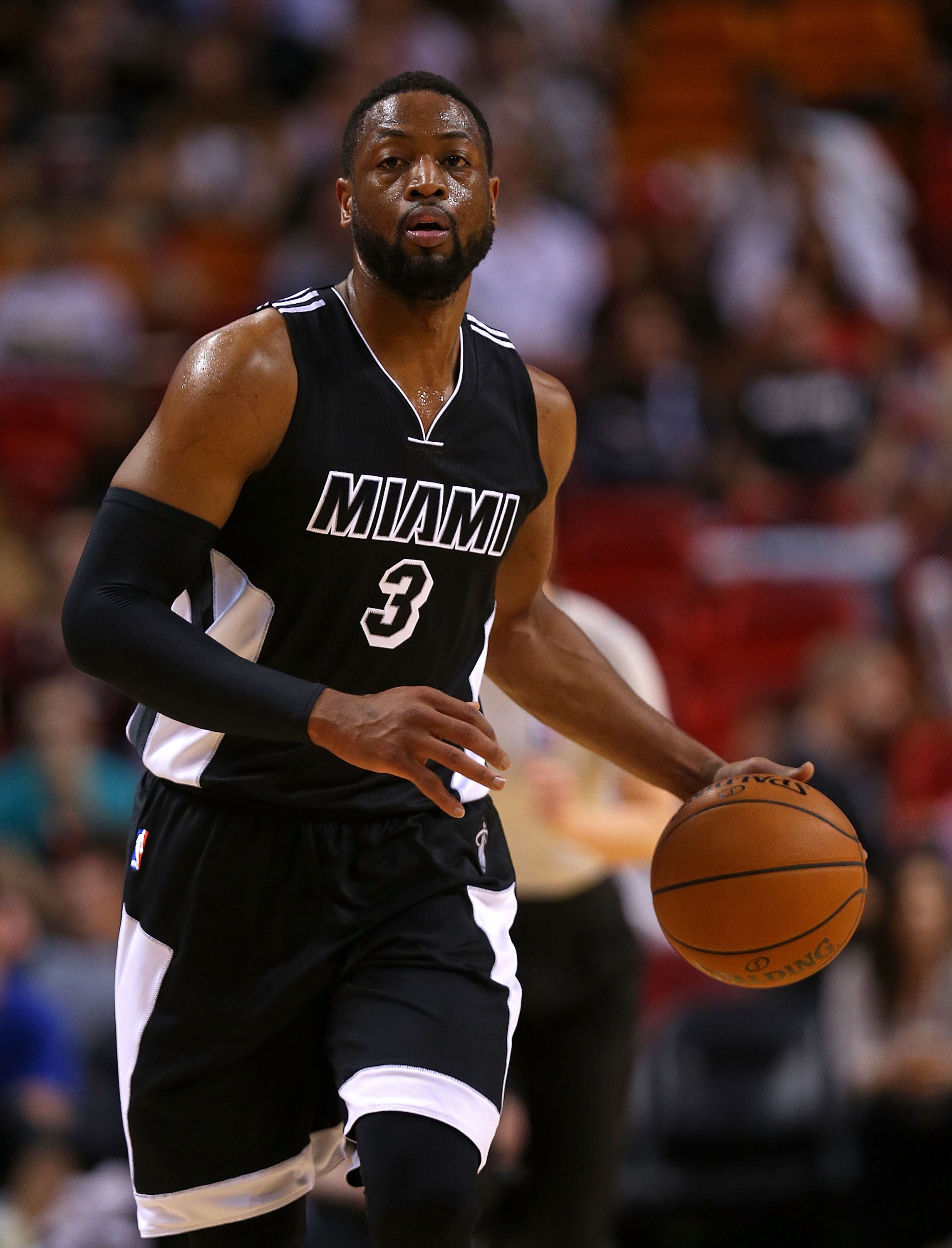 MIAMI, FL - JANUARY 23:  Dwyane Wade #3 of the Miami Heat looks to pass during a game against the Indiana Pacers at American Airlines Arena on January 23, 2015 in Miami, Florida. NOTE TO USER: User expressly acknowledges and agrees that, by downloading and/or using this photograph, user is consenting to the terms and conditions of the Getty Images License Agreement. Mandatory copyright notice:  (Photo by Mike Ehrmann/Getty Images)