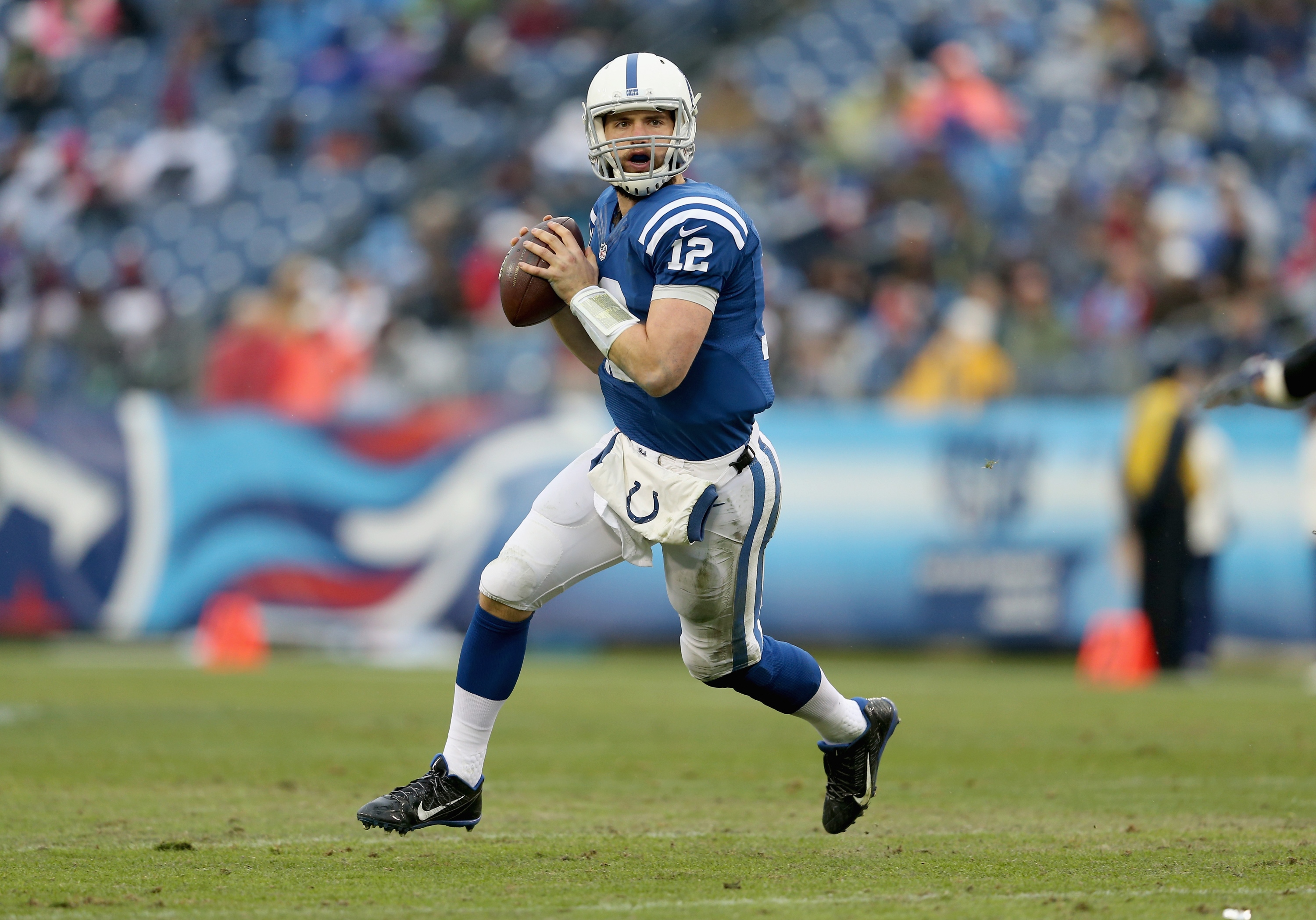 NASHVILLE, TN - DECEMBER 28: Andrew Luck #12 of the Indianapolis Colts looks to throw a pass during the game against the Tennessee Titans at LP Field on December 28, 2014 in Nashville, Tennessee. (Photo by Andy Lyons/Getty Images)
