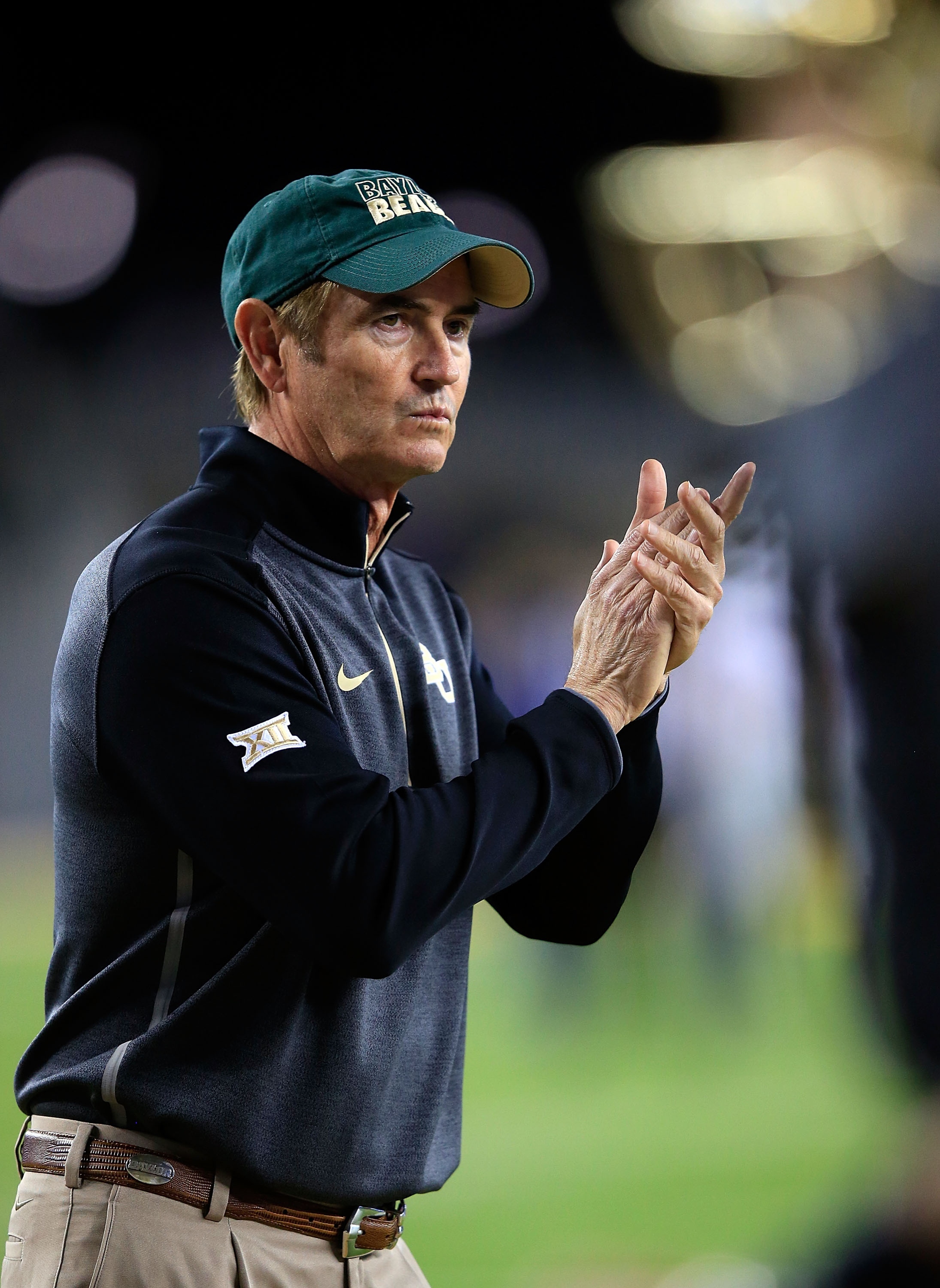 WACO, TX - DECEMBER 06:  Baylor Bears head coach Art Briles watches as his team goes through pregame drills for their game against the  Kansas State Wildcats on December 6, 2014  at McLane Stadium in Waco, Texas.  (Photo by Jamie Squire/Getty Images)