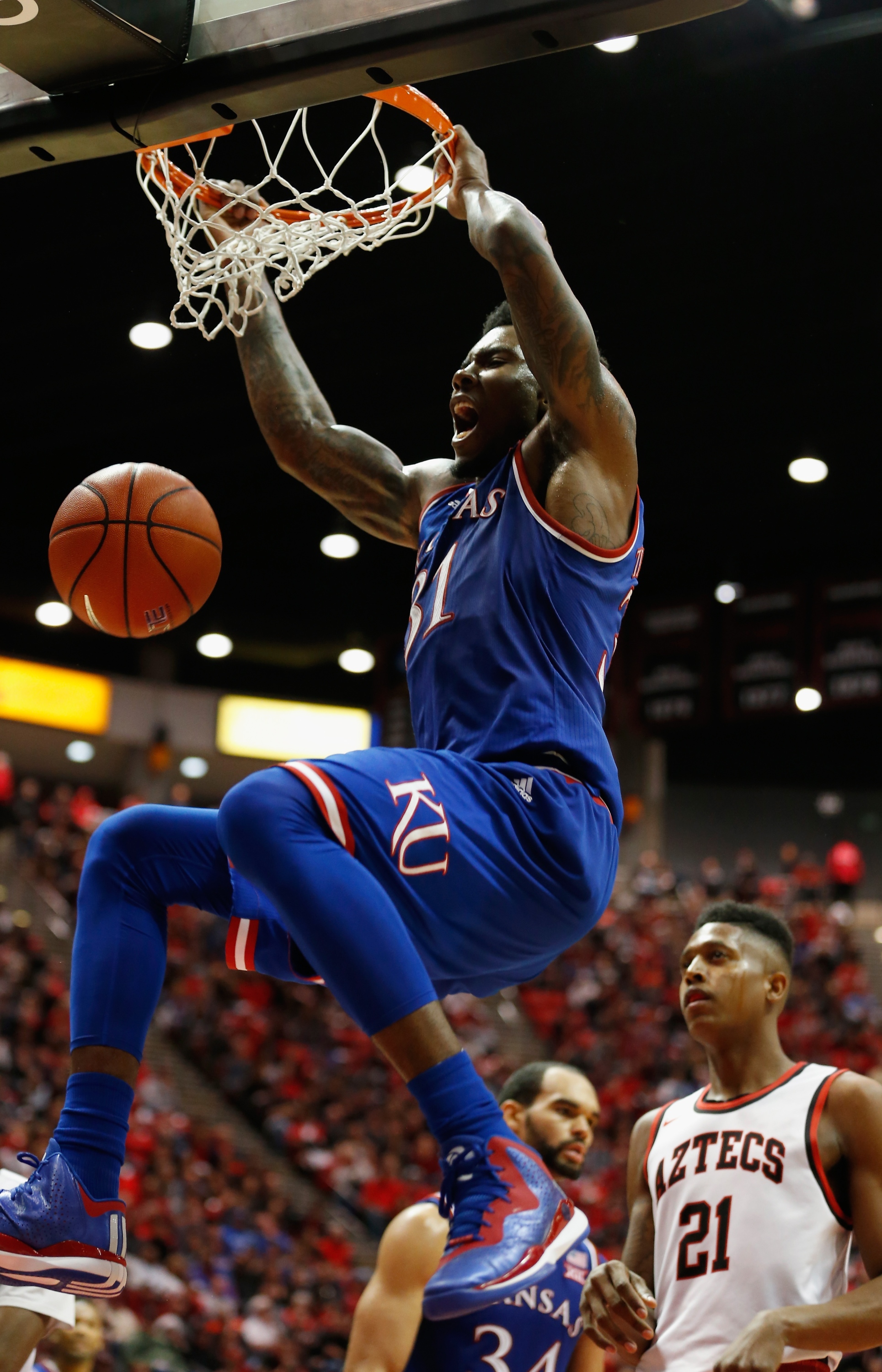 SAN DIEGO, CA - DECEMBER 22:  Jamari Traylor #31 of the Kansas Jayhawks dunks the ball during the second half of a game against the San Diego State Aztecs  at Viejas Arena on December 22, 2015 in San Diego, California.  (Photo by Sean M. Haffey/Getty Images)