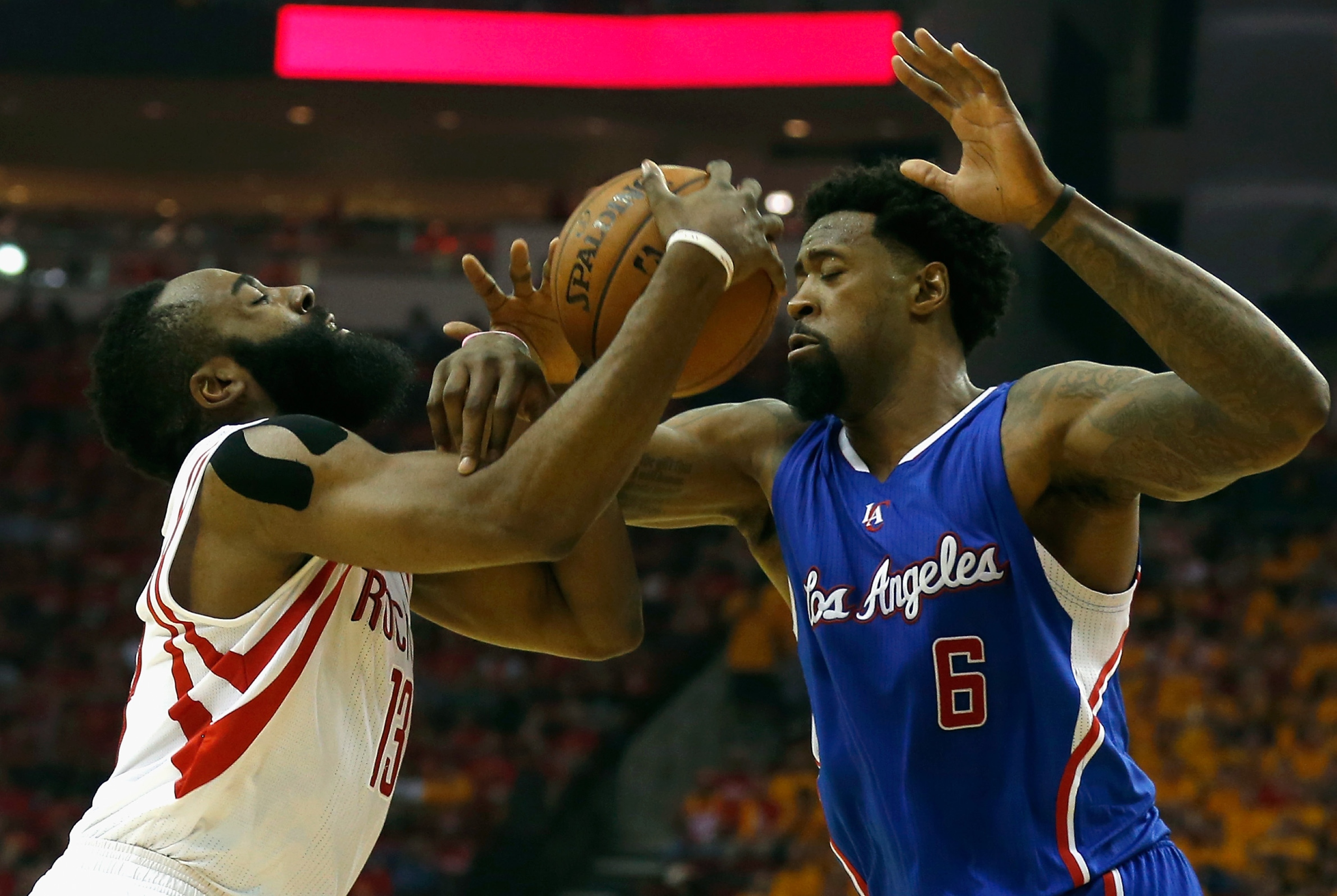 Can James Harden and company get DeAndre Jordan in foul trouble again? (Scott Halleran/Getty Images)