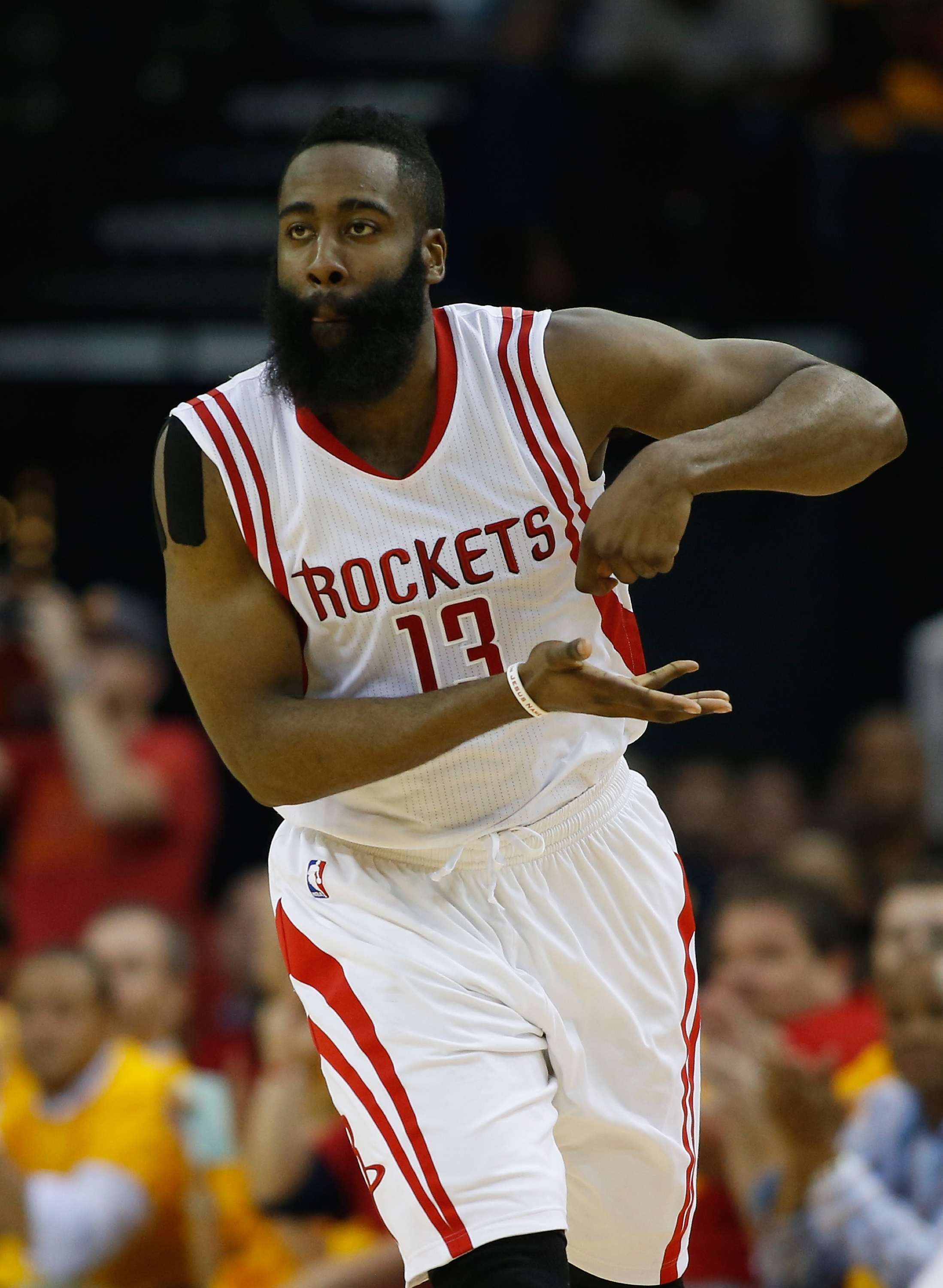 HOUSTON, TX - MAY 12: James Harden #13 of the Houston Rockets reacts after scoring against the Los Angeles Clippers during Game Five of the Western Conference Semifinals at the Toyota Center for the 2015 NBA Playoffs on May 12, 2015 in Houston, Texas. NOTE TO USER: User expressly acknowledges and agrees that, by downloading and/or using this photograph, user is consenting to the terms and conditions of the Getty Images License Agreement. (Photo by Scott Halleran/Getty Images)