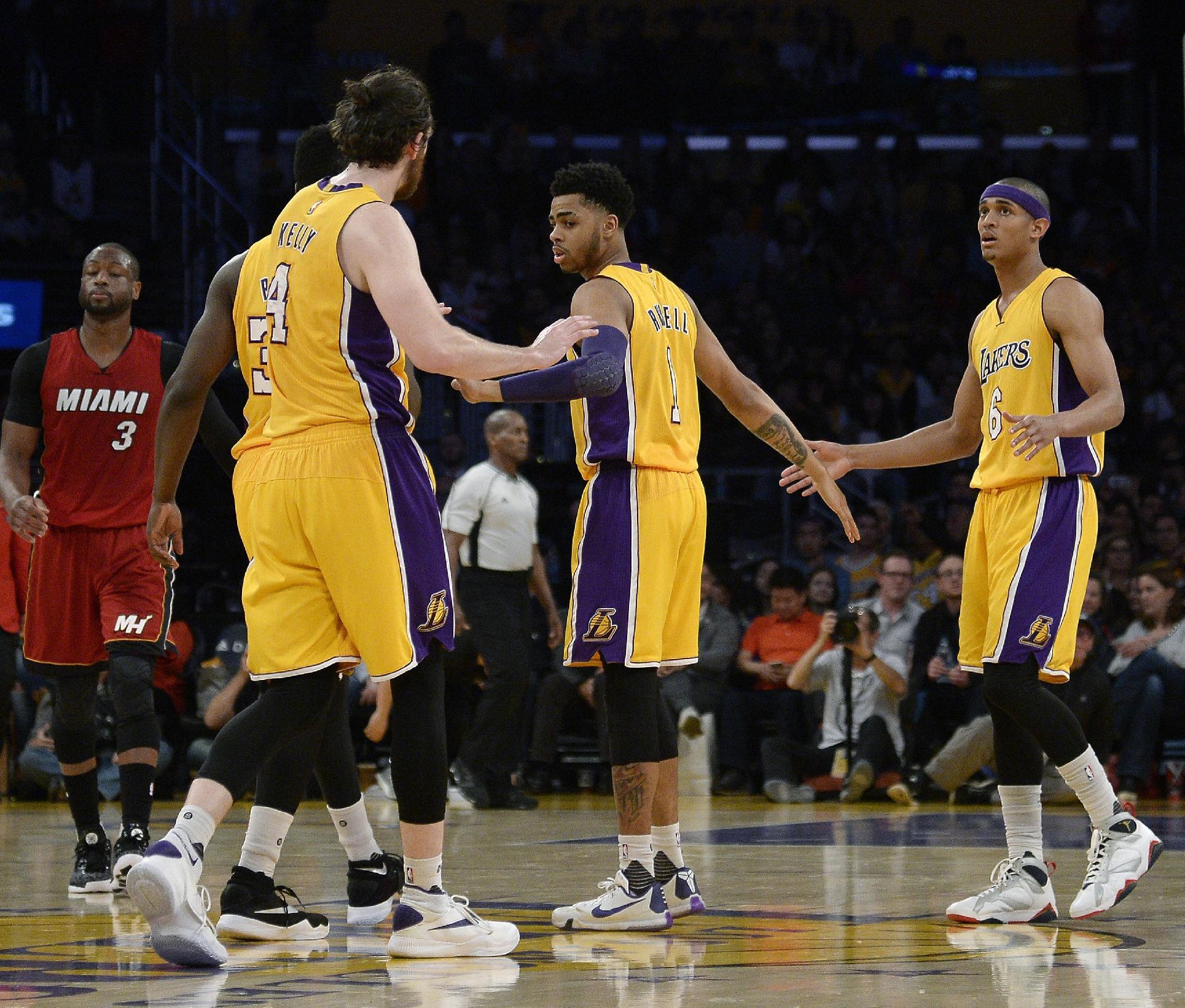 D'Angelo Russell reaches out to his teammates. (Kevork Djansezian/Getty Images)