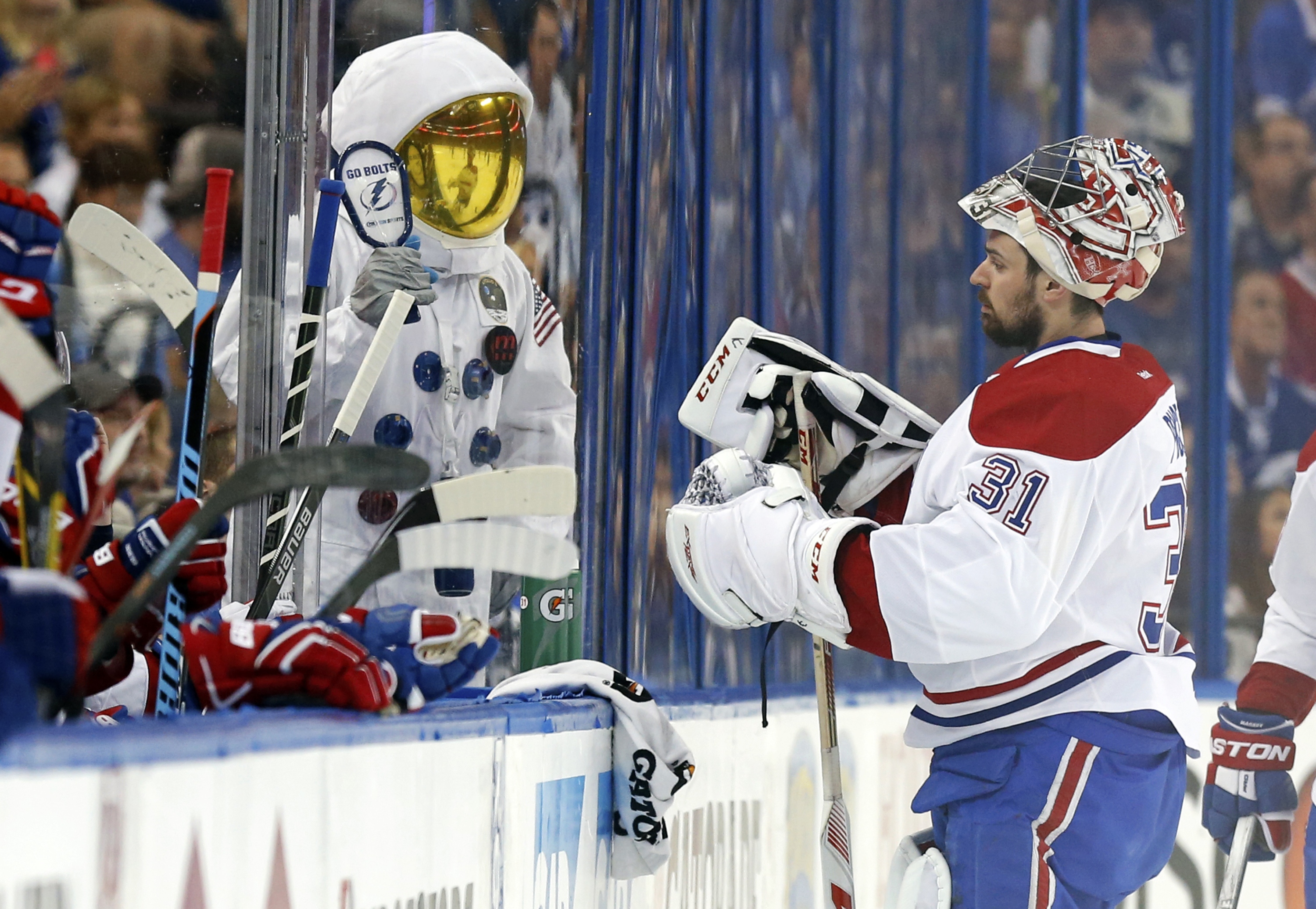 TAMPA, FL - MAY 12: A Tampa Bay Lightning fan dressed as an astronaut cheers in front of Carey Price #31 of the Montreal Canadiens in Game Six of the Eastern Conference Semifinals during the 2015 NHL Stanley Cup Playoffs at Amalie Arena on May 12, 2015 in Tampa, Florida. (Photo by Mike Carlson/Getty Images)