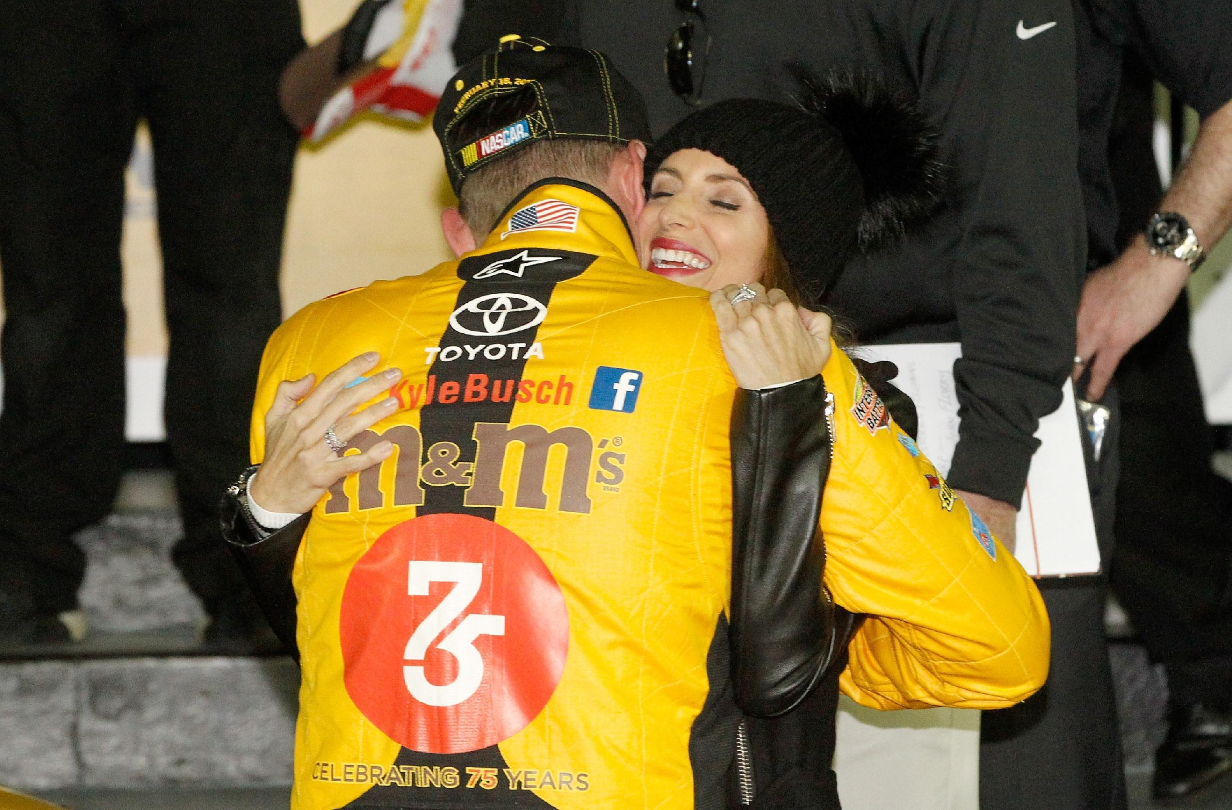A year after Kyle Busch wrecked at Daytona, he and wife Samantha were back celebrating. (Getty Images)
