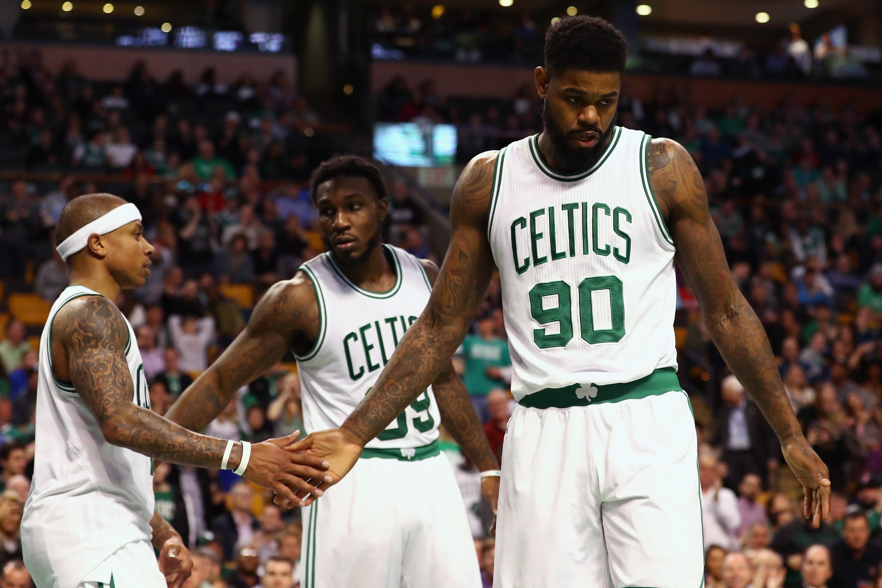 Signing Amir Johnson (right) and re-signing Jae Crowder (center) made the Celtics deeper and tougher. (Maddie Meyer/Getty Images)