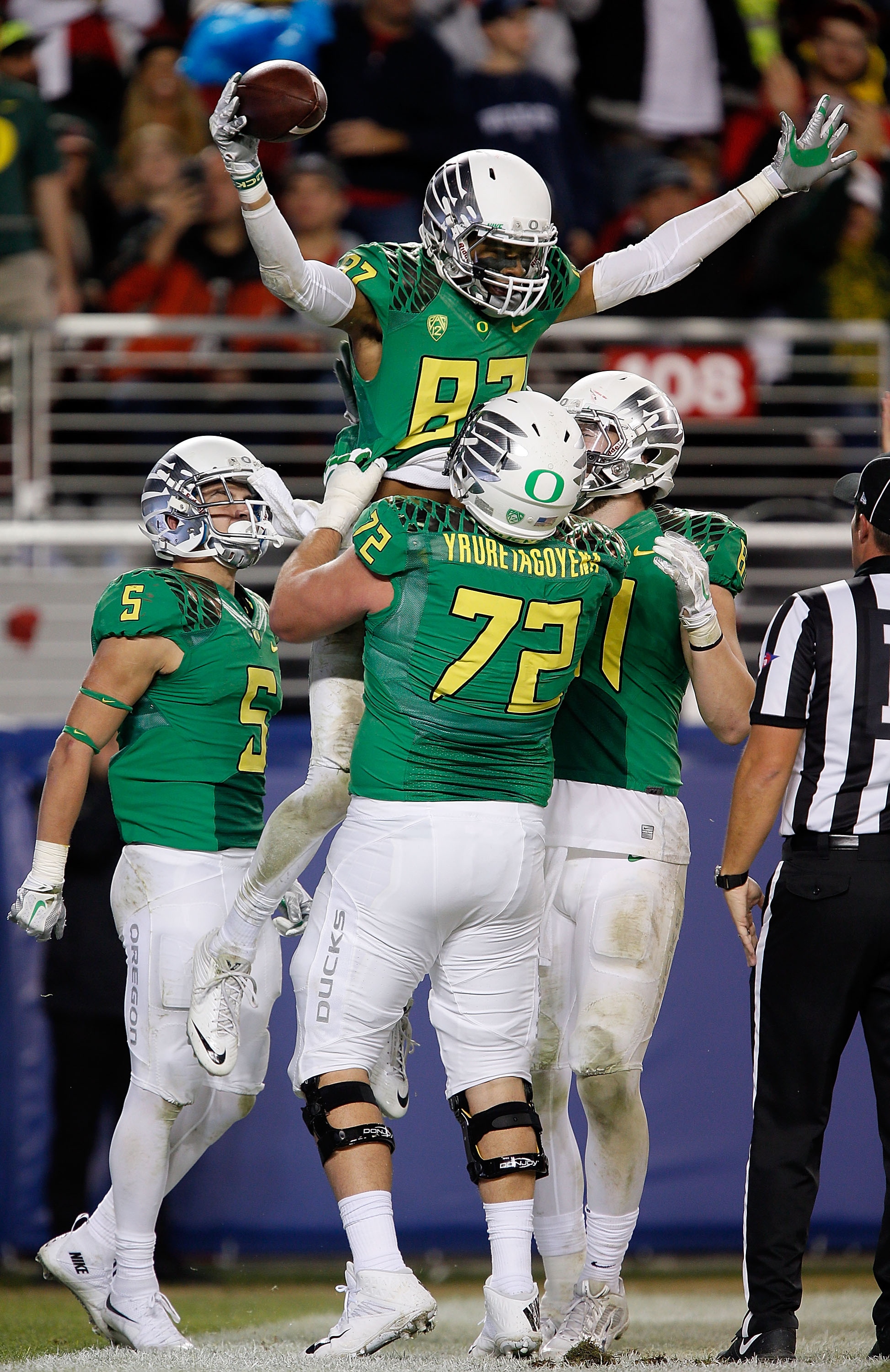 SANTA CLARA, CA - DECEMBER 05:  Andre Yruretagoyena #72 of the Oregon Ducks and Darren Carrington #87 of the Oregon Ducks celebrate a third quarter touchdown against the Arizona Wildcats during the PAC-12 Championships at Levi's Stadium on December 5, 2014 in Santa Clara, California.  (Photo by Brian Bahr/Getty Images)