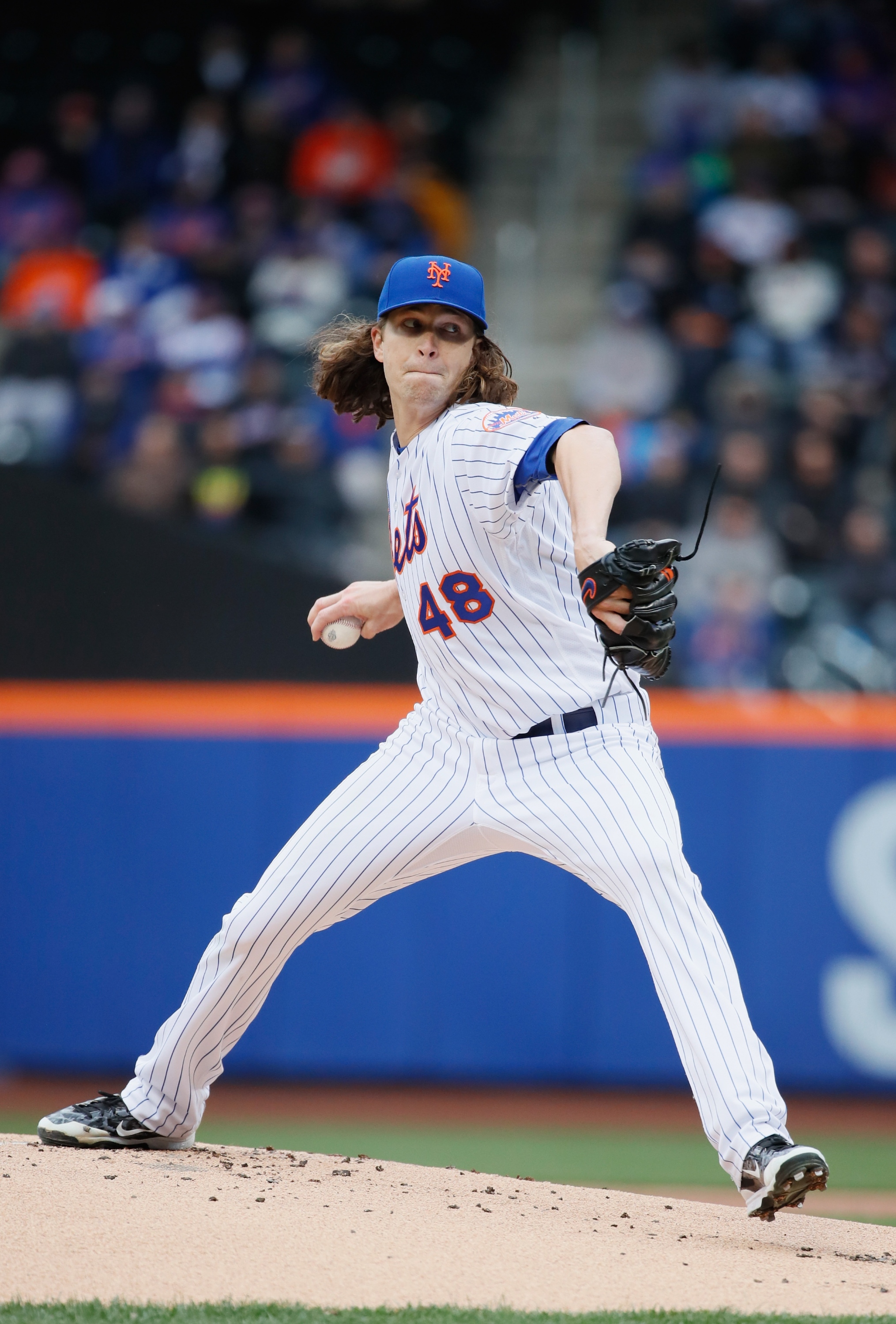 NEW YORK, NY - APRIL 08:  Jacob deGrom #48 of the New York Mets pitches against the Philadelphia Phillies in the first inning during the Mets Home Opening Day at Citi Field on April 8, 2016 in New York City.  (Photo by Al Bello/Getty Images)