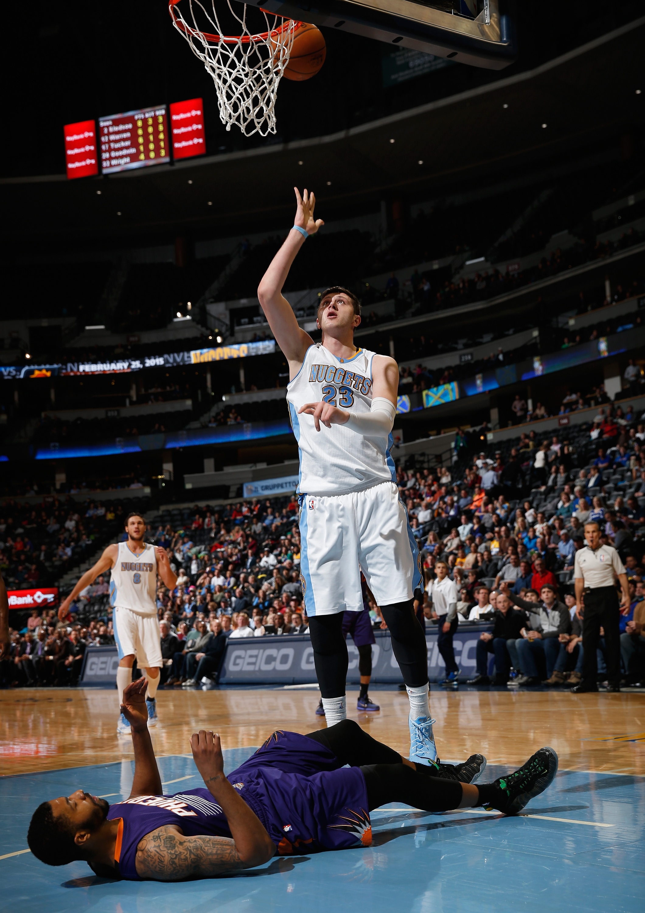 Jusuf Nurkic hits a layup after depositing Markieff Morris on the deck. (Doug Pensinger/Getty Images)