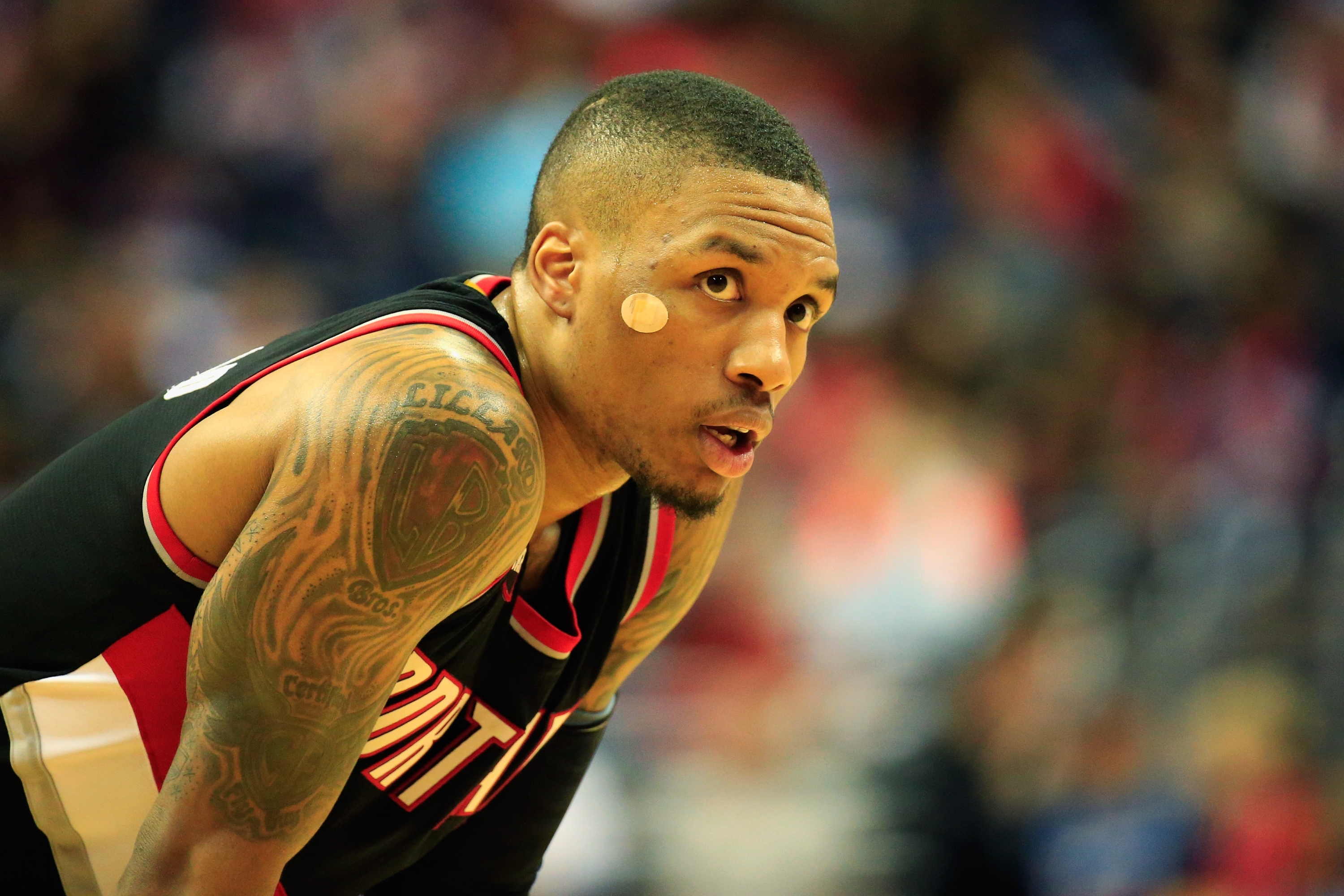 Damian Lillard's sticking around Rip City for the next few years. (Rob Carr/Getty Images)