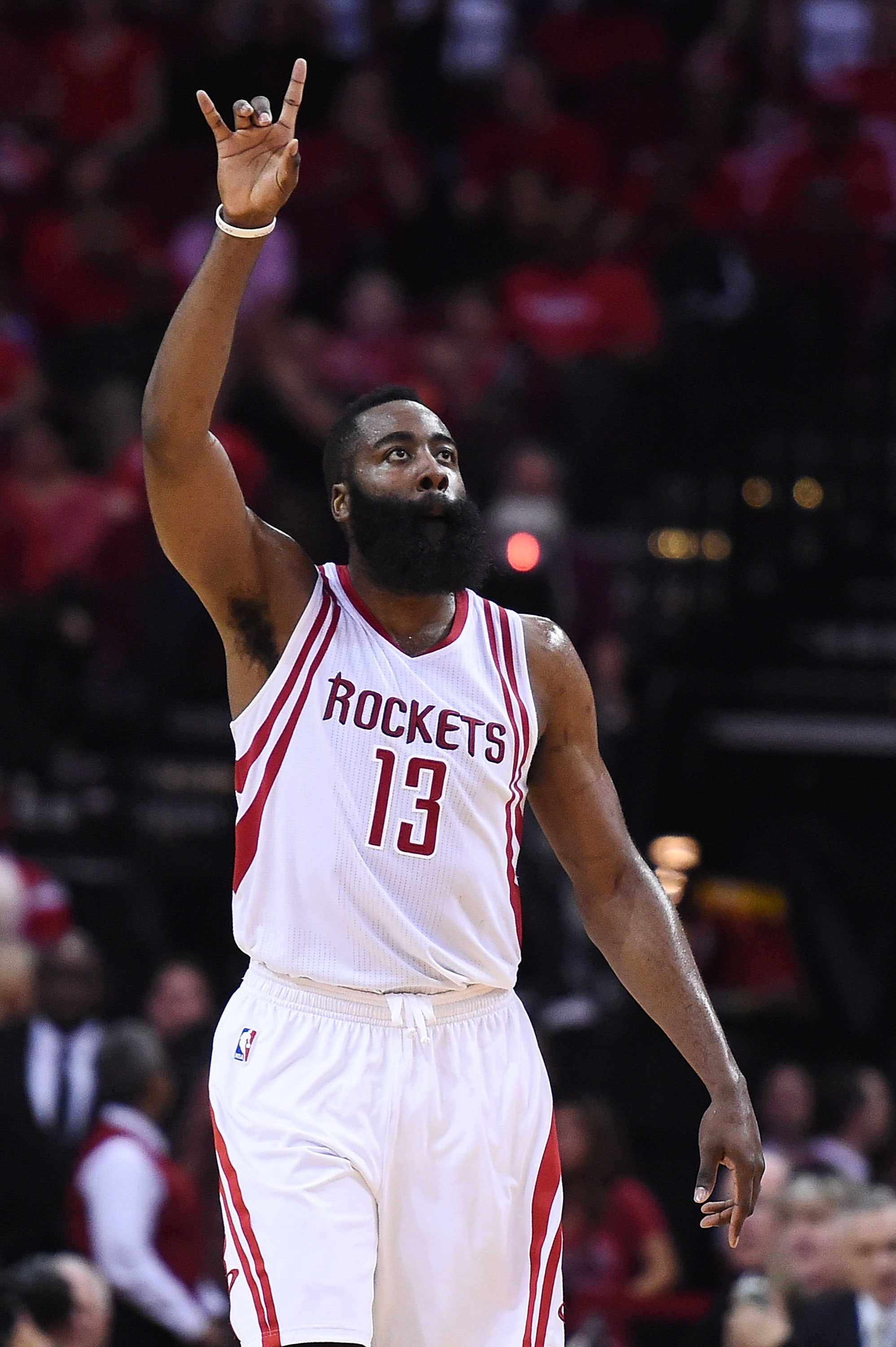 James Harden calls for a waiter. (Stacy Revere/Getty Images)