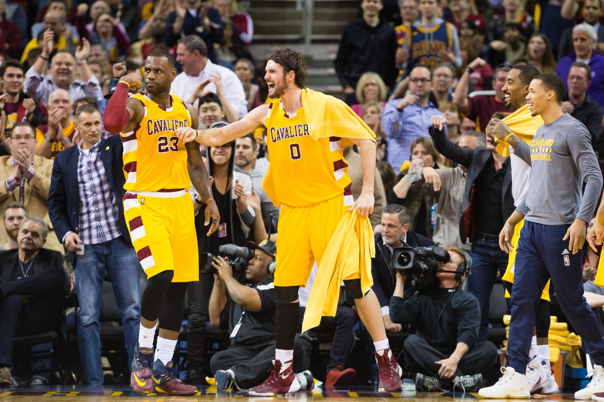 LeBron James and Kevin Love celebrate good times rolling in Cleveland. (Jason Miller/Getty Images)