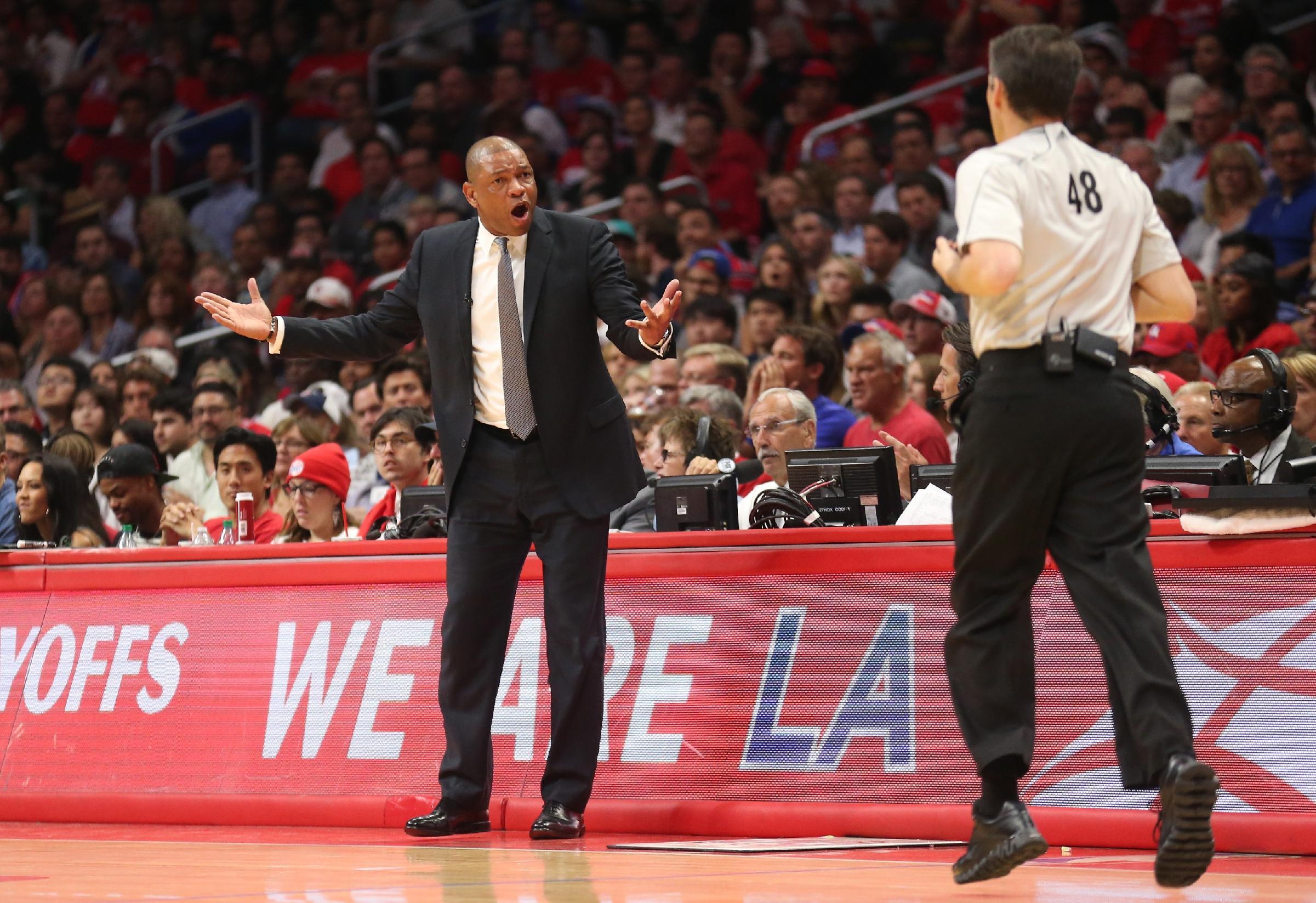 Doc Rivers complains to referee Scott Foster during Game 5. (Stephen Dunn/Getty Images)