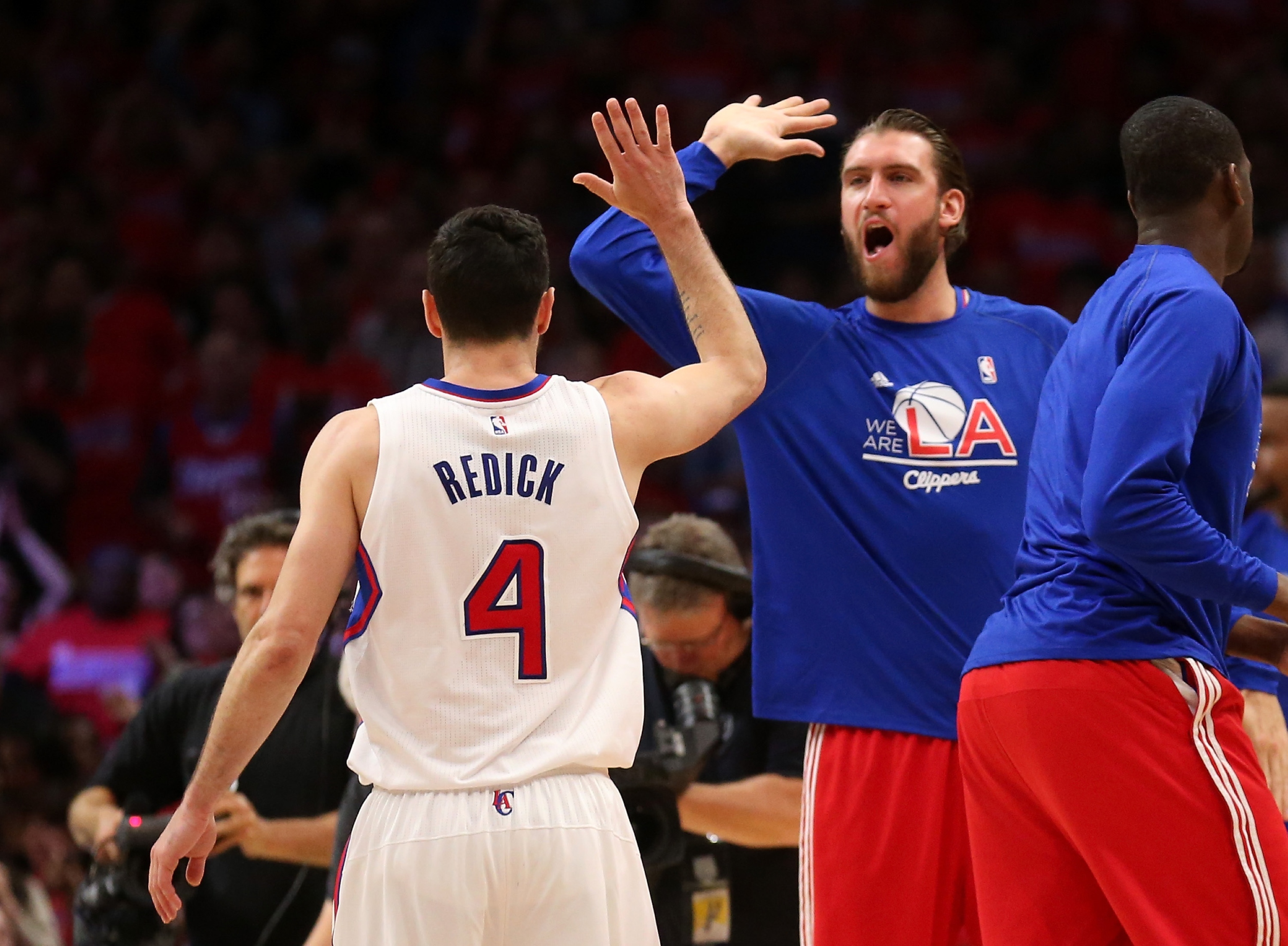 Spencer Hawes contributes. (Stephen Dunn/Getty Images)