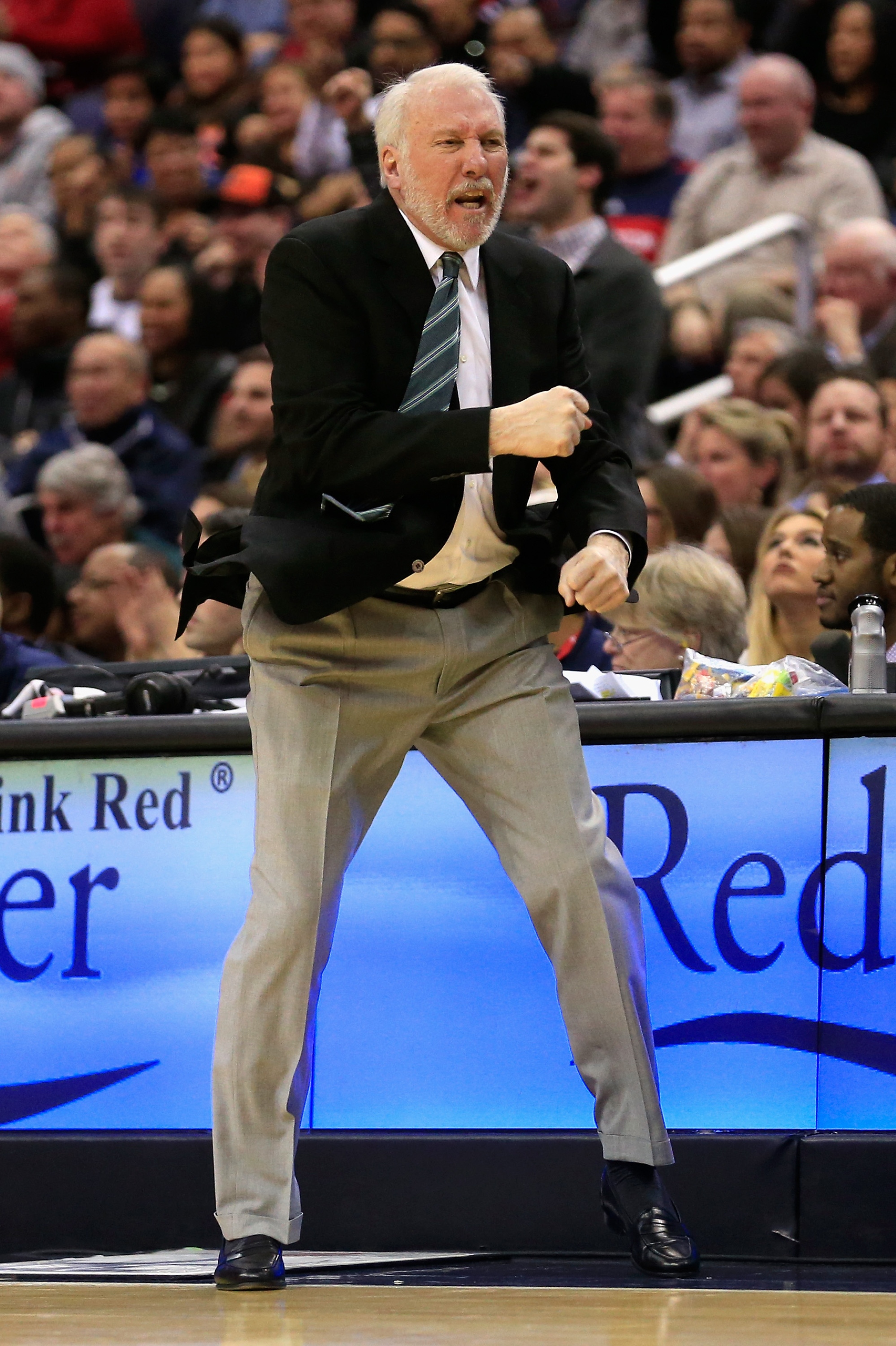 Gregg Popovich yells at cloud. (Photo by Rob Carr/Getty Images)
