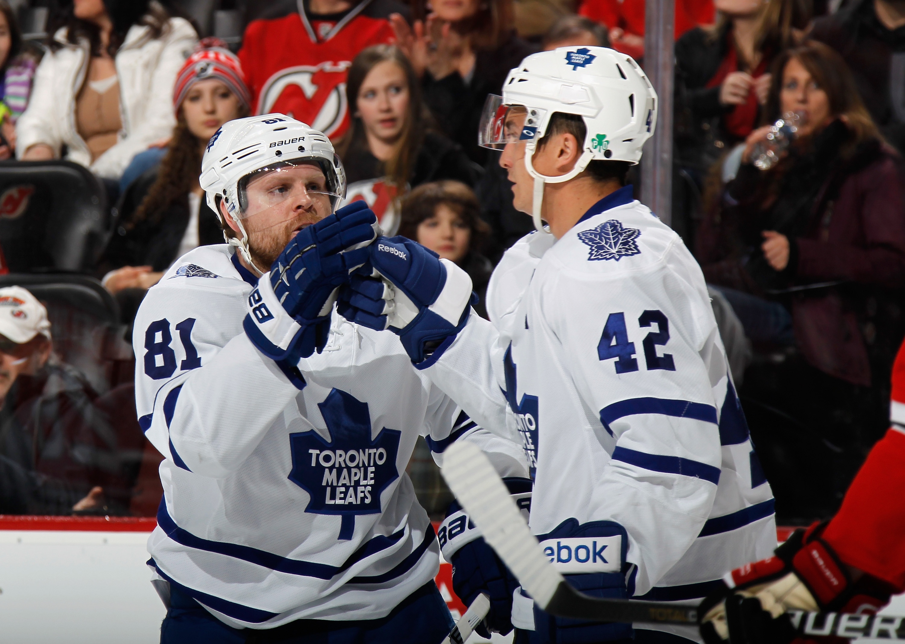 NEWARK, NJ - FEBRUARY 06: Tyler Bozak #42 of the Toronto Maple Leafs (r) celebrates his powerplay goal at 11:51 of the third period against the New Jersey Devils along with Phil Kessel #81 (l) at the Prudential Center on February 6, 2015 in Newark, New Jersey. The Devils defeated the Maple Leafs 4-1. (Photo by Bruce Bennett/Getty Images)