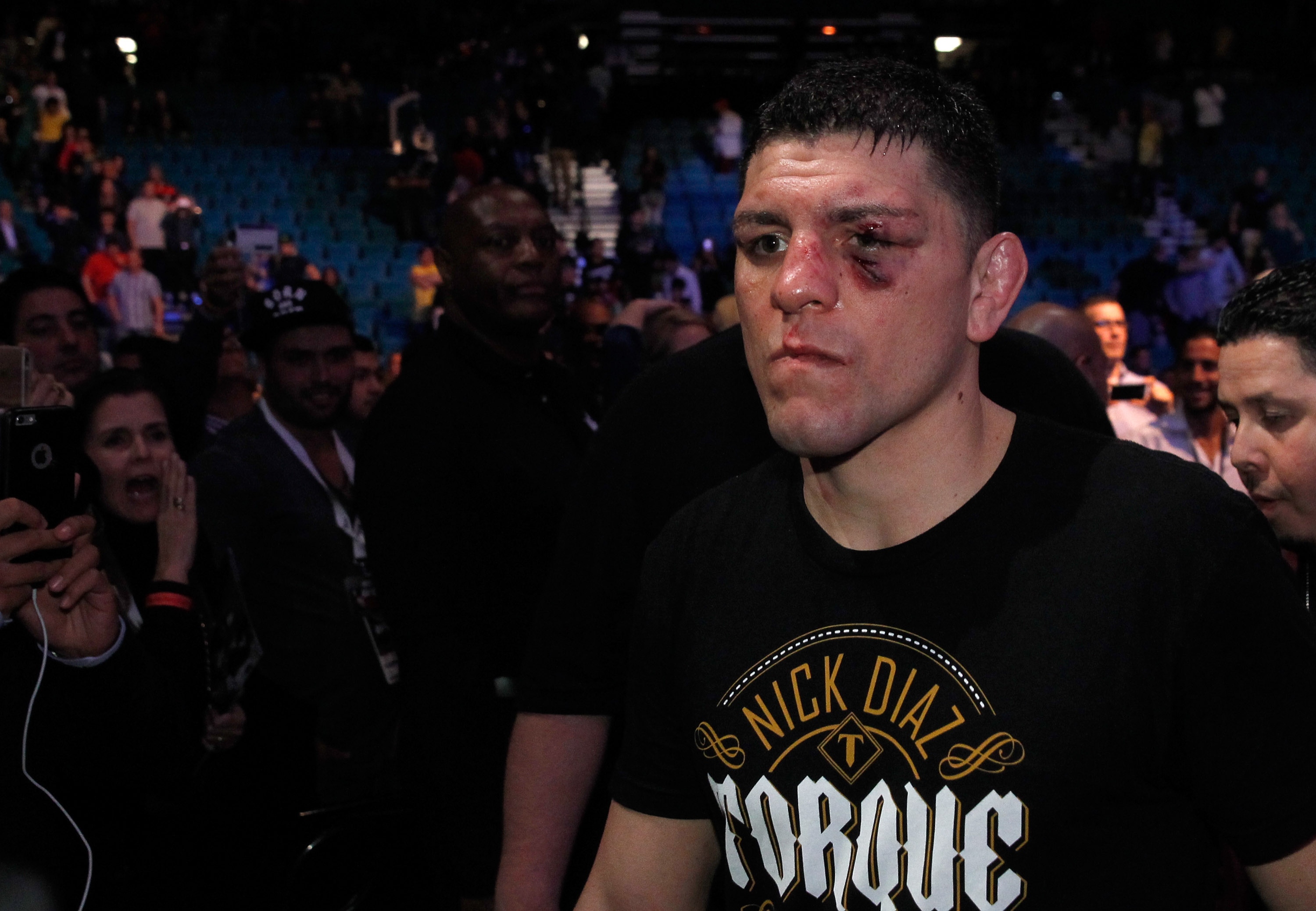 Nick Diaz leaves the arena after losing to Anderson Silva at UFC 183. (Getty)