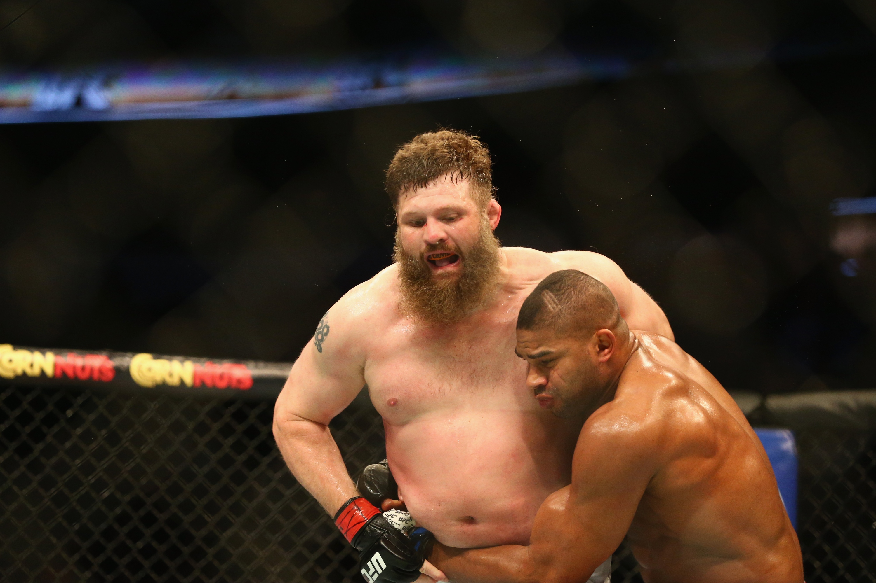 Roy Nelson tries to fend off a takedown during his fight with Alistair Overeem. (Getty)