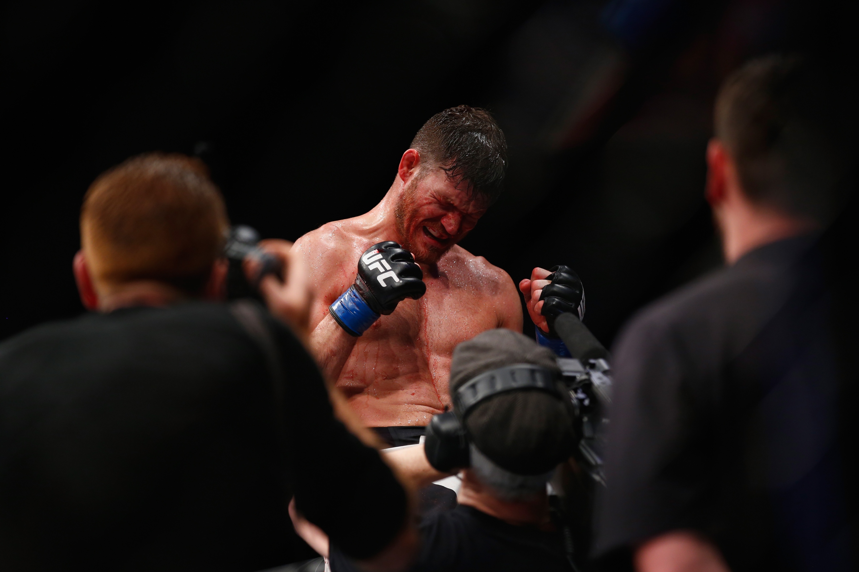 Michael Bisping of Great Britain celebrates his victory over Anderson Silva. (Getty)
