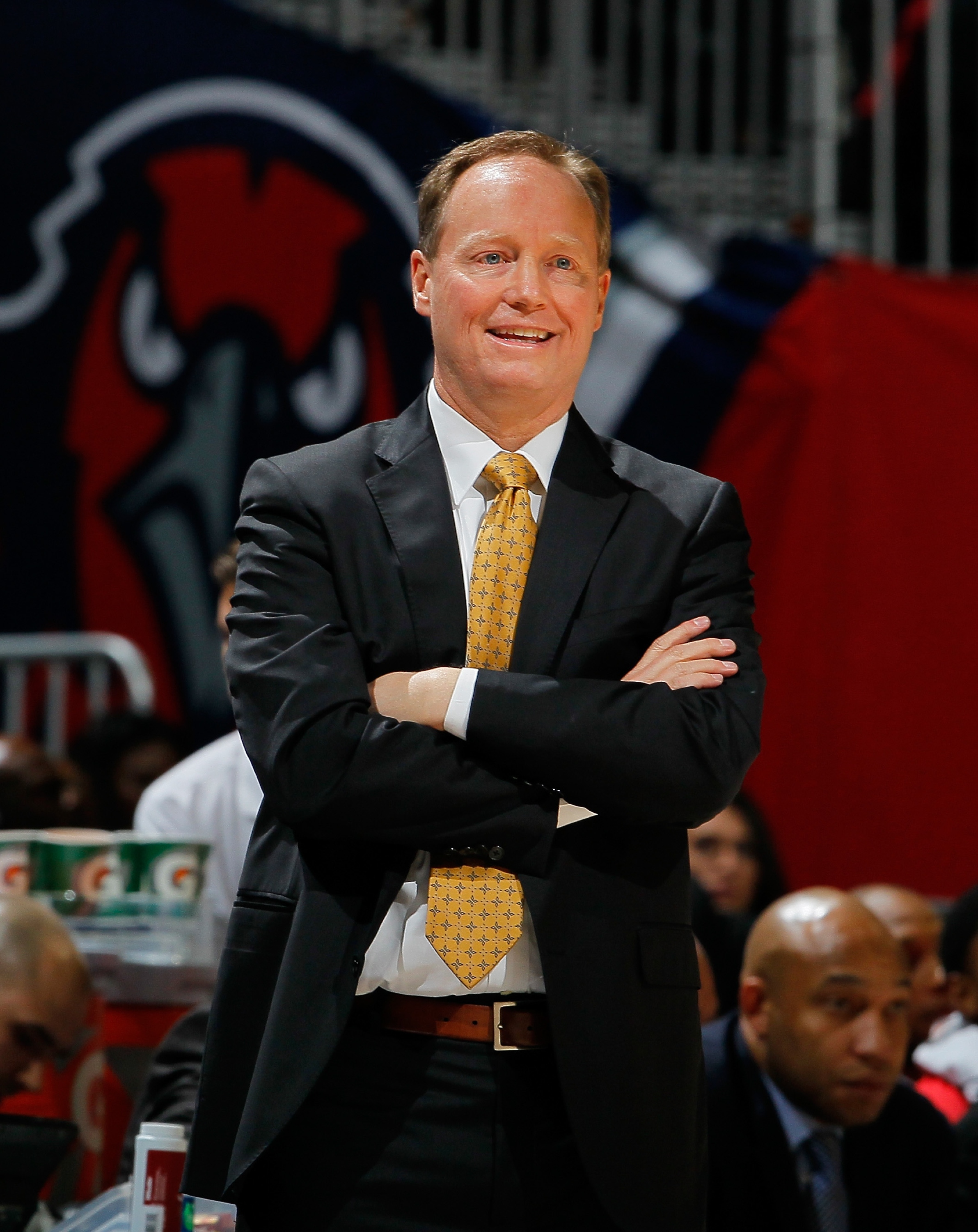 Mike Budenholzer of the Atlanta Hawks allows himself a smile. (Kevin C. Cox/Getty Images)