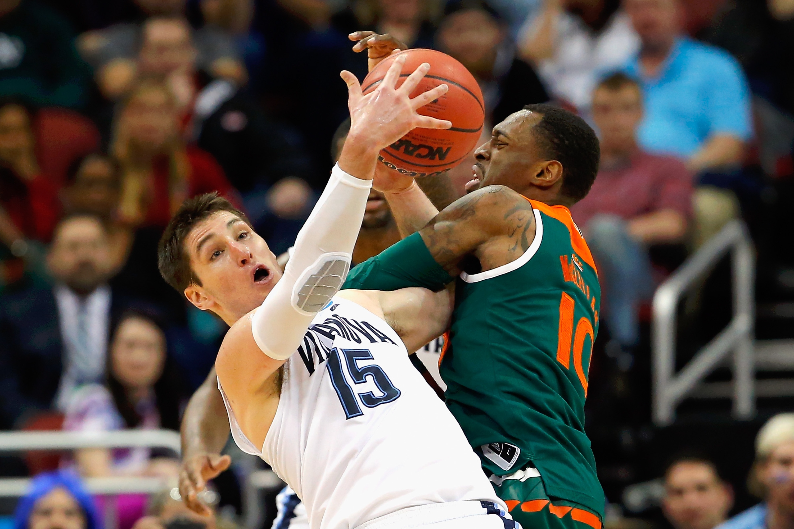 LOUISVILLE, KY - MARCH 24:  Ryan Arcidiacono #15 of the Villanova Wildcats and Sheldon McClellan #10 of the Miami Hurricanes battle for the ball in the first half of their game during the third round of the 2016 NCAA Men's Basketball Tournament at KFC YUM! Center on March 24, 2016 in Louisville, Kentucky.  (Photo by Kevin C. Cox/Getty Images)