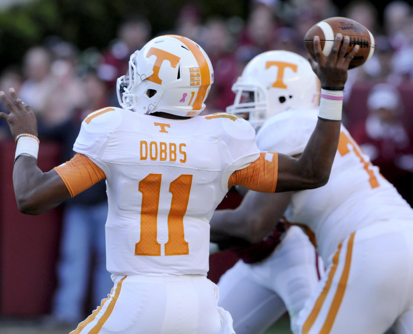 In this Oct. 26, 2013, photo Tennessee quarterback Josh Dobbs passes against Alabama during a NCAA football game in Tuscaloosa, Ala. (AP Photo/Michael Patrick, Knoxville News Sentinel)