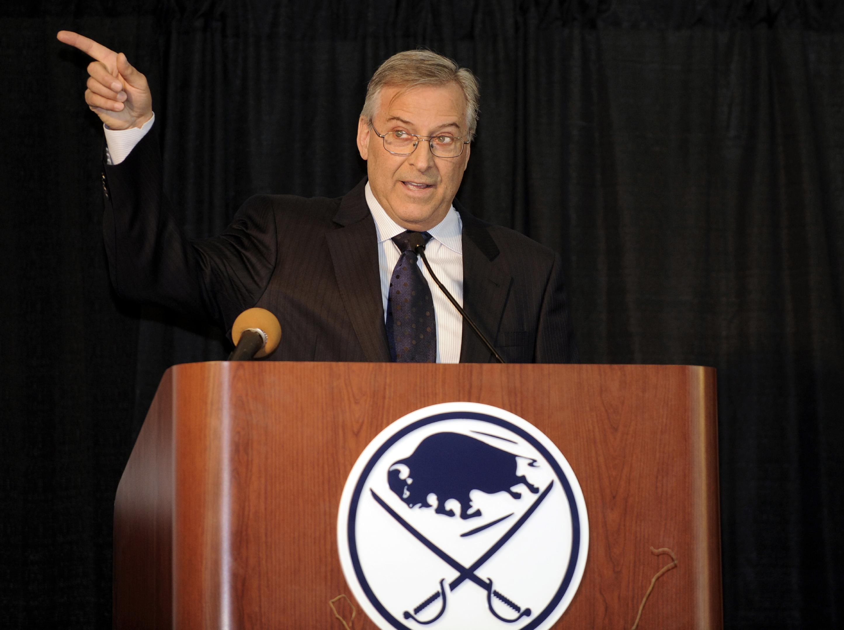 Buffalo Sabres' owner Terry Pegula, gestures toward the First Niagara Center and explains development plans during groundbreaking ceremonies before an NHL hockey game against the Philadelphia Flyers in Buffalo, N.Y., Saturday, April 13, 2013. (AP Photo/Gary Wiepert)