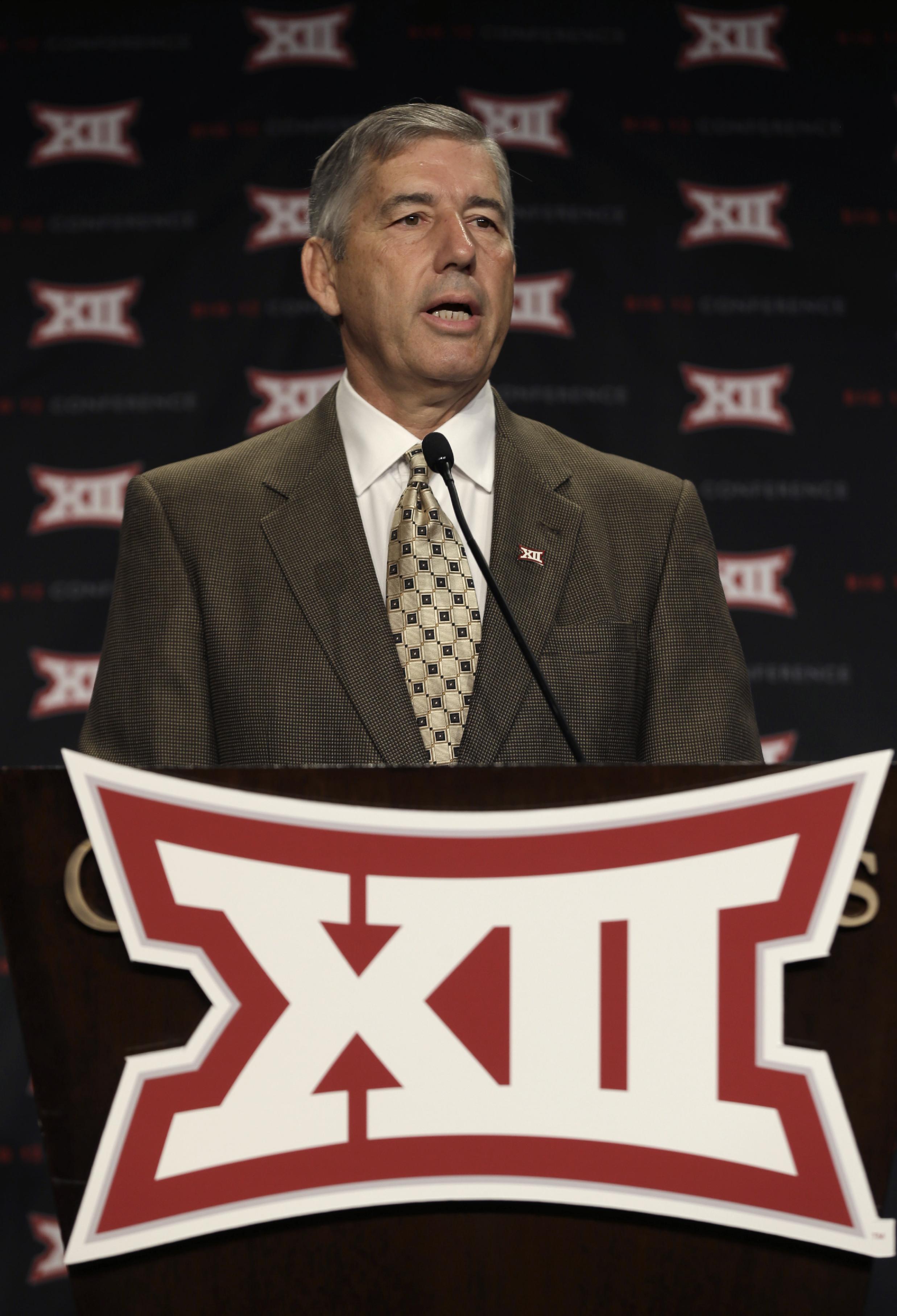 Big 12 commissioner Bob Bowlsby speaks at the opening of the NCAA college Big 12 Conference football media days in Dallas, Monday, July 21, 2014. (AP Photo/LM Otero)