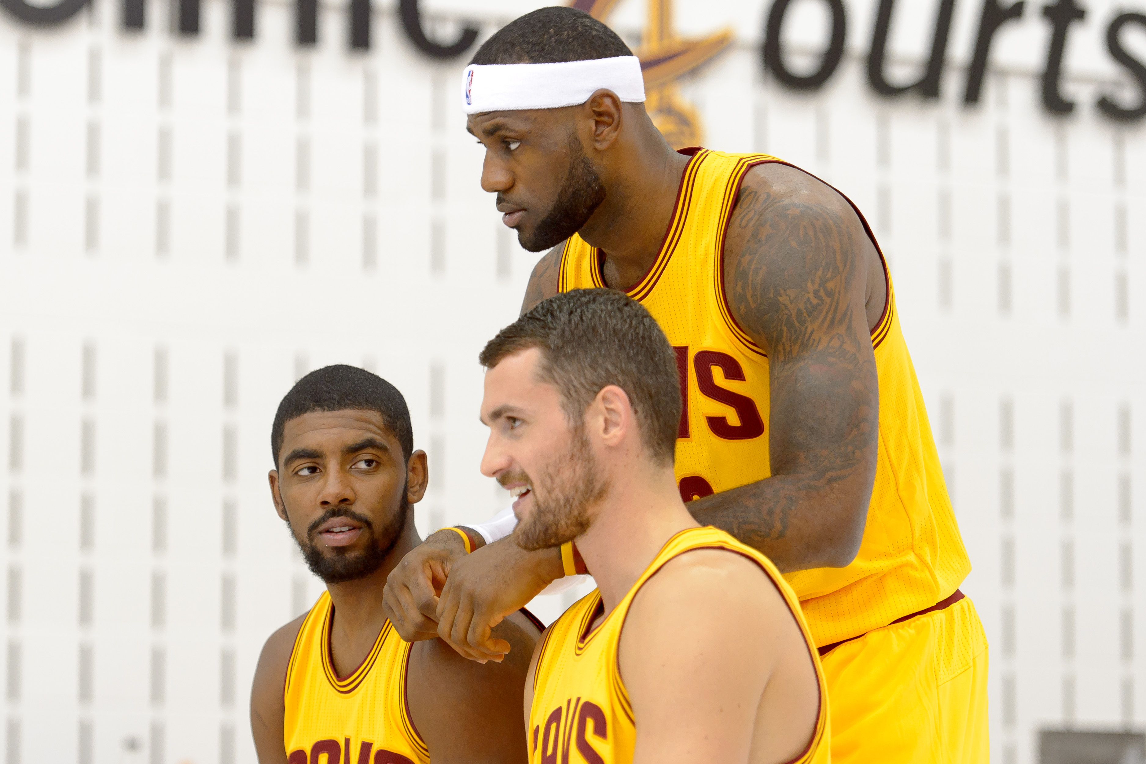 INDEPENDENCE, OH - SEPTEMBER 25: Kevin Love #0 Kyrie Irving #2 and LeBron James #23 of the Cleveland Cavaliers pose for a photo during media day at Cleveland Clinic Courts on September 25, 2014 in Independence, Ohio. (Photo by Jason Miller/Getty Images)