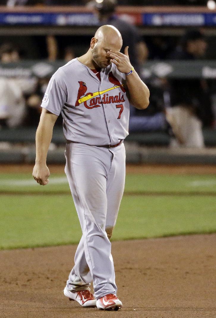 Matt Holliday hangs his head after being left on base in the seventh. (AP)