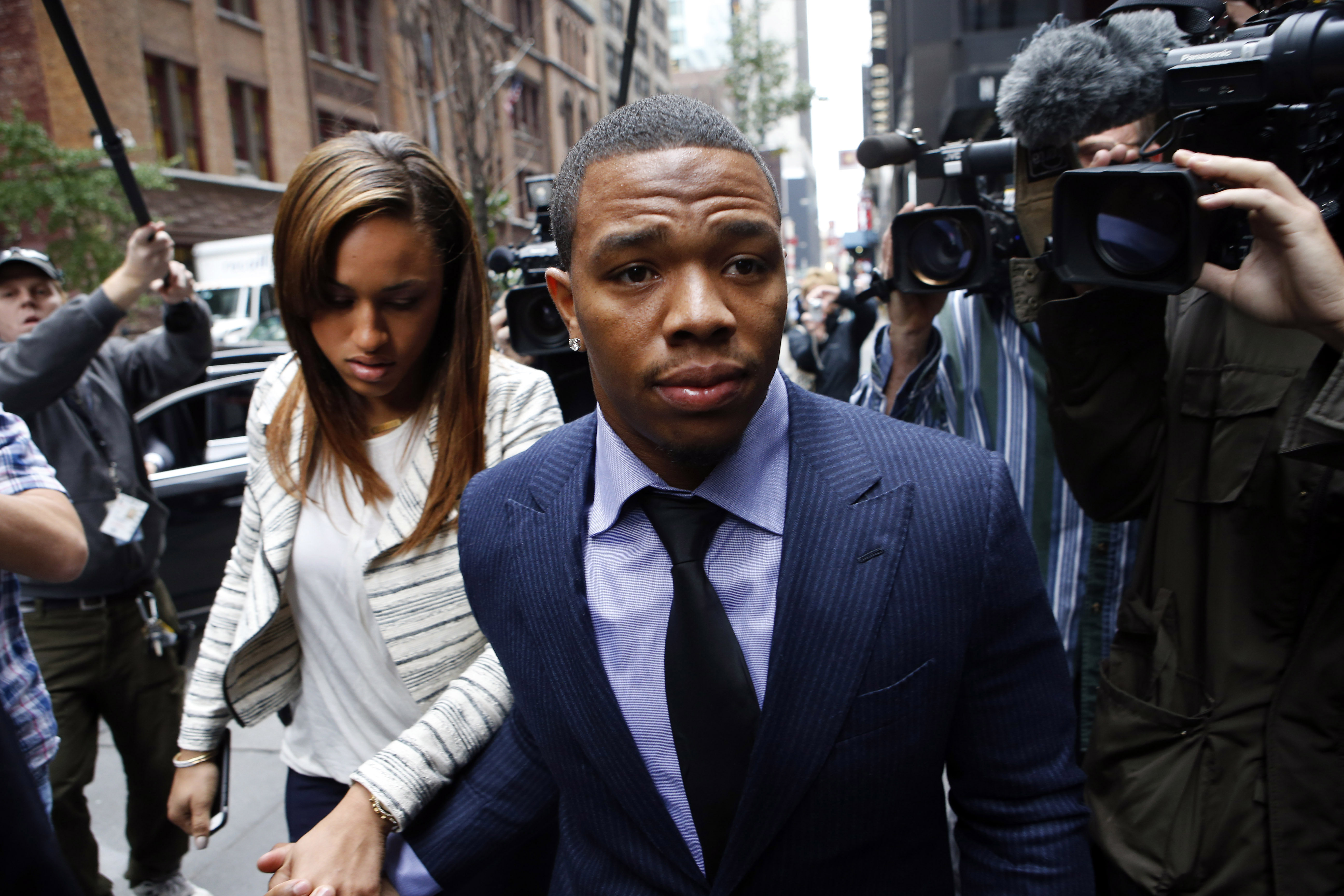 FILE - In this Nov. 5, 2014, file photo, Ray Rice arrives with his wife Janay Palmer for an appeal hearing of his indefinite suspension from the NFL in New York. Rice has won the appeal of his indefinite suspension by the NFL, which has been "vacated immediately," the NFL football players' union said Friday, Nov. 28, 2014. (AP Photo/Jason DeCrow, File)