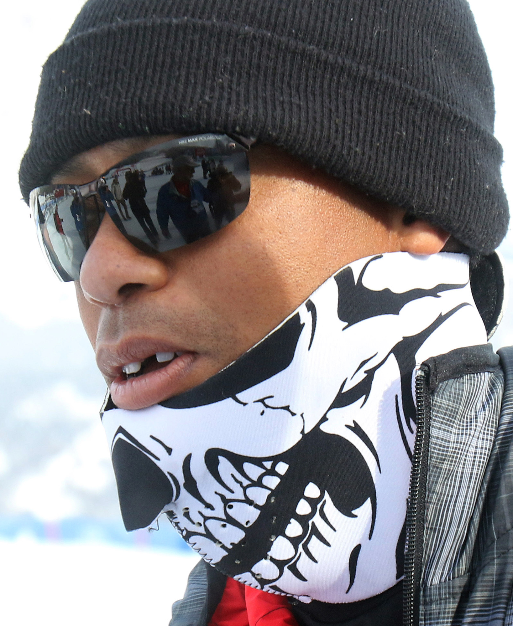 Tiger Woods walks in the finish area of an alpine ski, women's World Cup super-G, in Cortina d'Ampezzo, Italy, Monday, Jan. 19, 2015. Lindsey Vonn won a super-G Monday for her record 63rd World Cup victory and celebrated with an embrace from a surprise visitor boyfriend Tiger Woods. The American broke Annemarie Moser-Proell's 35-year-old record of 62 World Cup wins with a flawless run down the Olympia delle Tofane course, finishing 0.85 ahead of Anna Fenninger of Austria. (AP Photo/Armando Trovati)