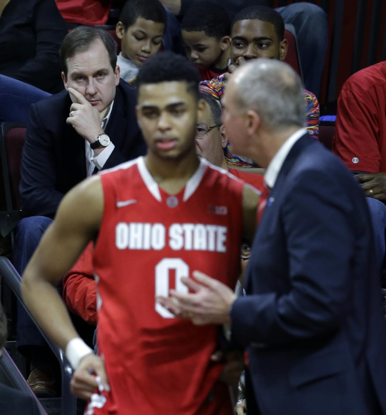 The 76ers' Sam Hinkie, seen here watching D'Angelo Russell, could land three of the top 11 picks. (AP/Mel Evans)