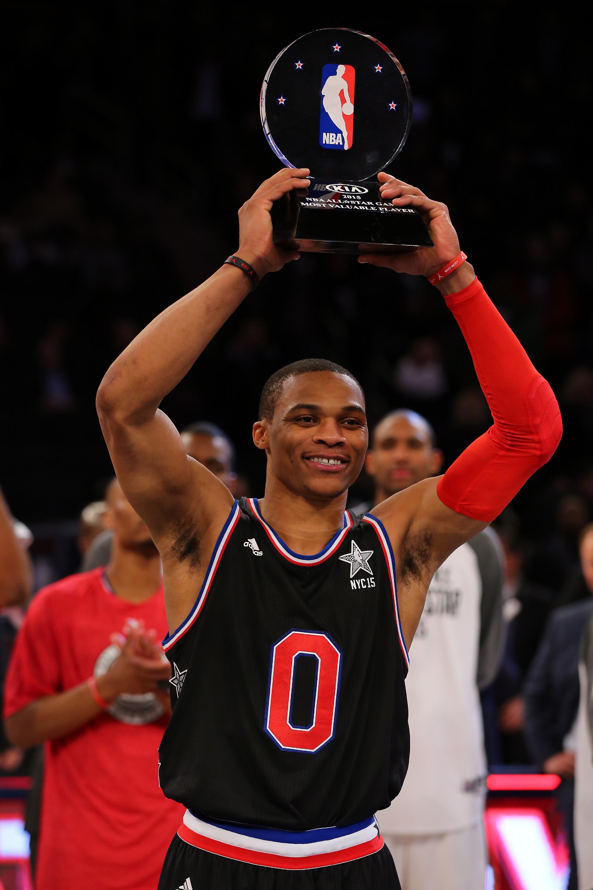 Russell Westbrook celebrates after winning the MVP Trophy in the 2015 NBA All-Star Game. (Elsa/Getty Images)