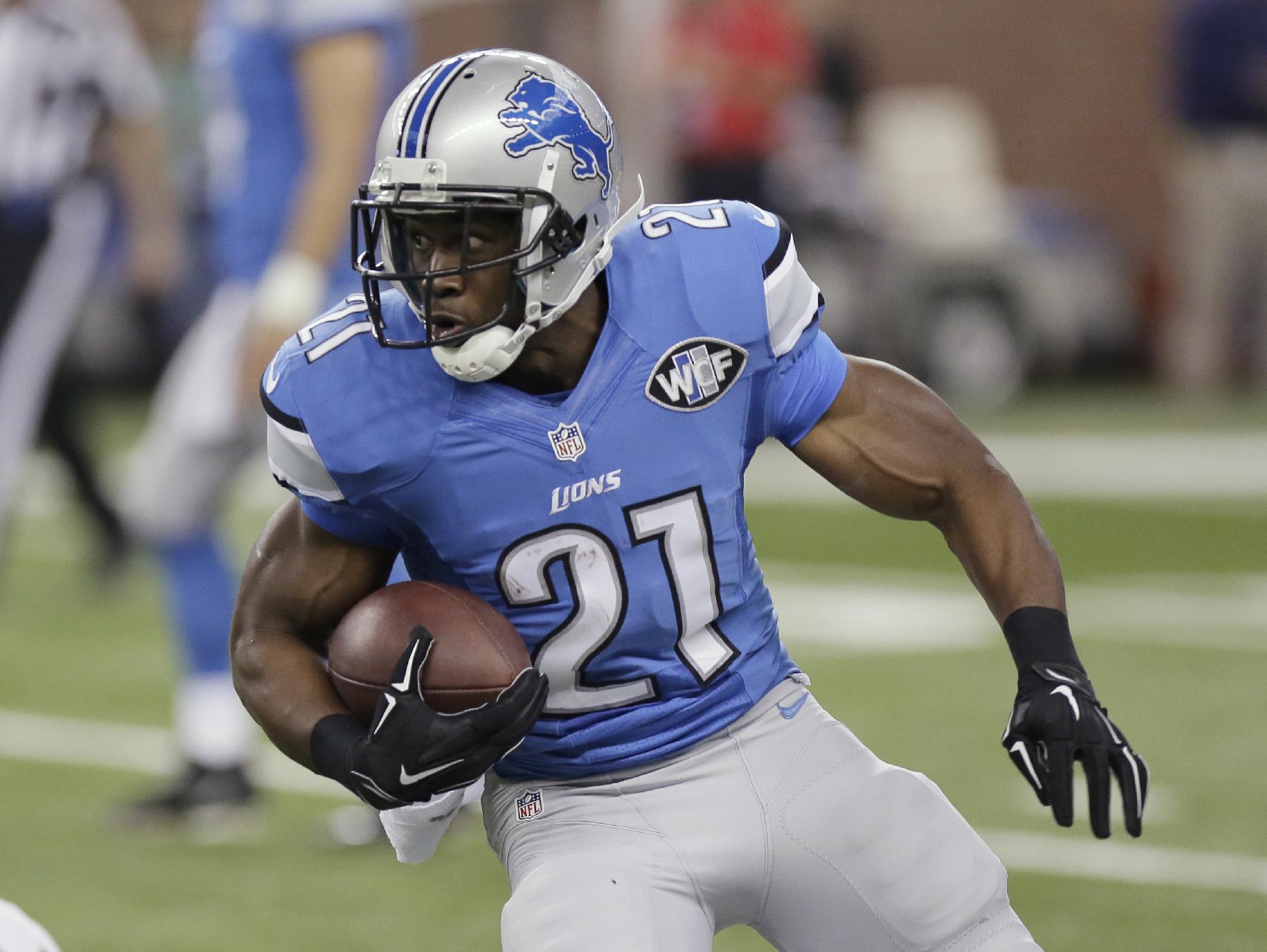 FILE - In this Oct. 29, 2014, file photo, Detroit Lions running back Reggie Bush carries the ball against the New Orleans Saints during an NFL football game in Detroit. The Lions released Bush on Wednesday, Feb. 25, 2015, halfway through the four-year deal he signed as a free agent before the 2013 season. (AP Photo/Duane Burleson, File)