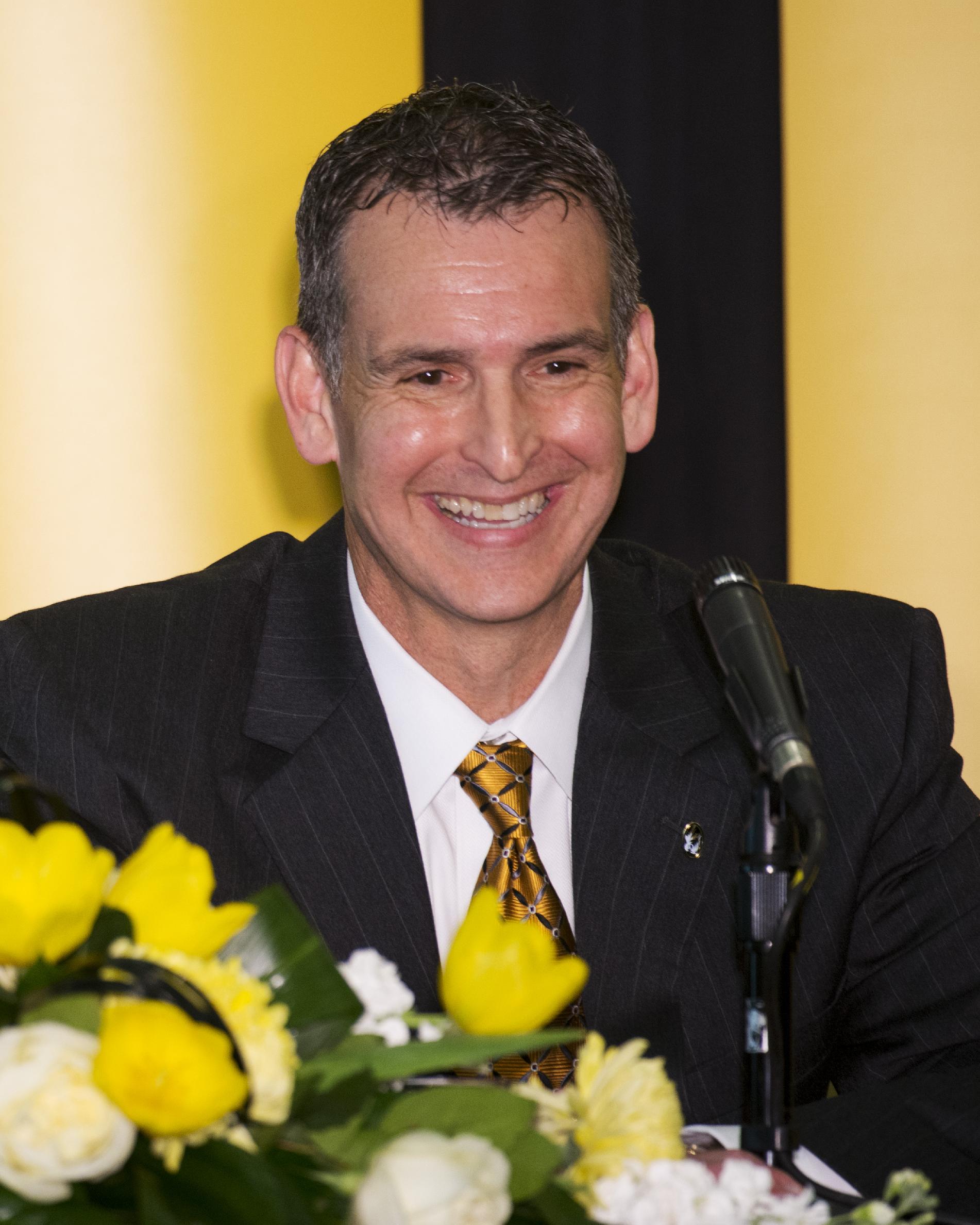 Missouri athletic director Mack Rhoades smiles during his introductory press conference Tuesday, March 10, 2015, on the University of Missouri campus in Columbia, Mo. (AP Photo/L.G. Patterson)