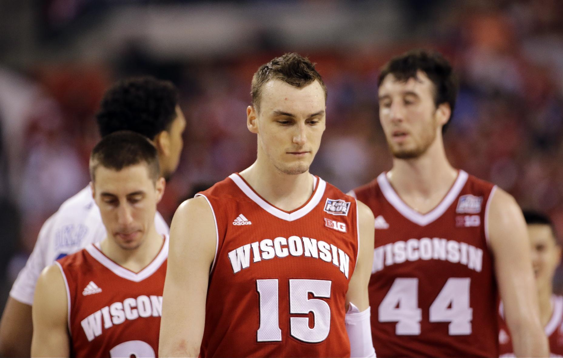 Wisconsin players react during the second half of Monday's loss. (AP)