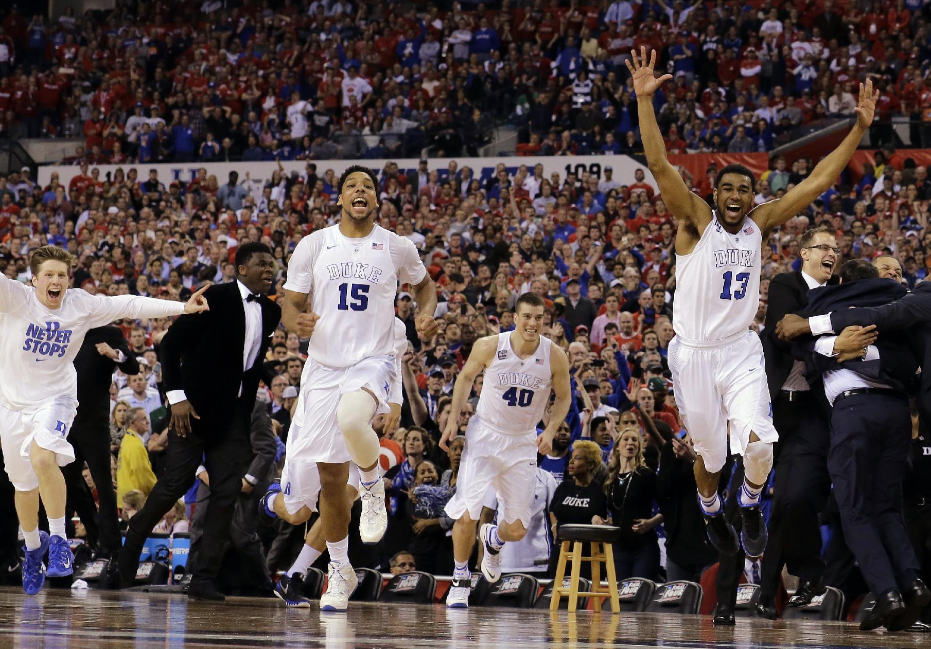Duke players celebrate after the NCAA Final Four college basketball tournament championship game. (AP)
