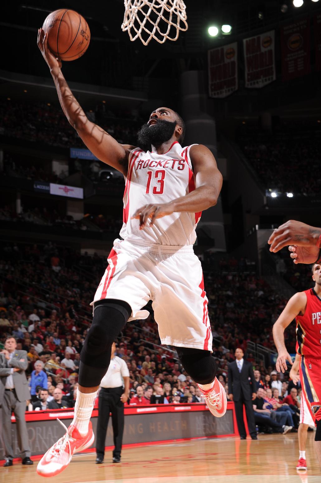 HOUSTON, TX - APRIL 12: James Harden #13 of the Houston Rockets goes to the basket against the New Orleans Pelicans on April 12, 2015 at the Toyota Center in Houston, Texas. (Photo by Bill Baptist/NBAE via Getty Images)