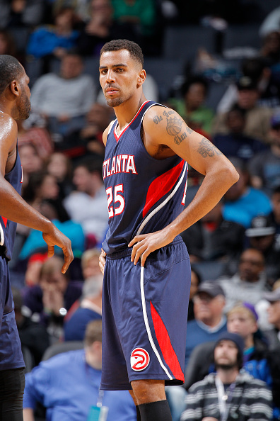CHARLOTTE, NC - MARCH 28: Thabo Sefolosha #25 of the Atlanta Hawks looks on during the game against the Charlotte Hornets on March 28, 2015 at Time Warner Cable Arena in Charlotte, North Carolina. (Photo by Rocky Widner/Getty Images)