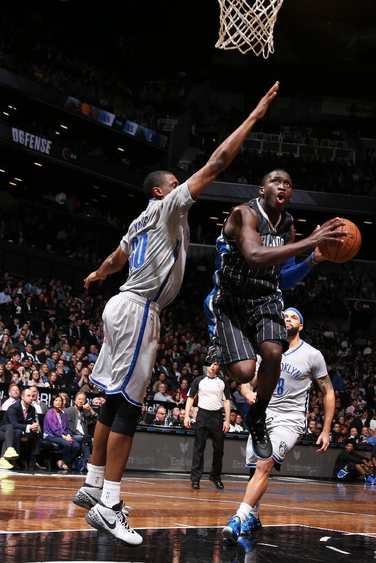 NEW YORK, NY - APRIL 15: Victor Oladipo #5 of the Orlando Magic goes up for a shot against the Brooklyn Nets on April 15, 2015 at the Barclays Center in the Brooklyn borough of New York City. (Photo by Nathaniel S. Butler/NBAE via Getty Images)