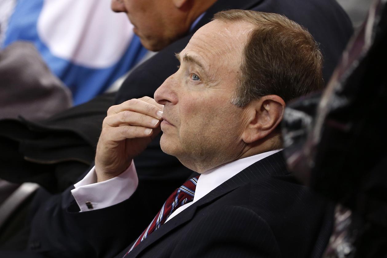 NHL commissioner Gary Bettman watches the first period of a first-round NHL playoff hockey game between the Pittsburgh Penguins and the New York Rangers in Pittsburgh on Wednesday, April 22, 2015.(AP Photo/Gene J. Puskar)