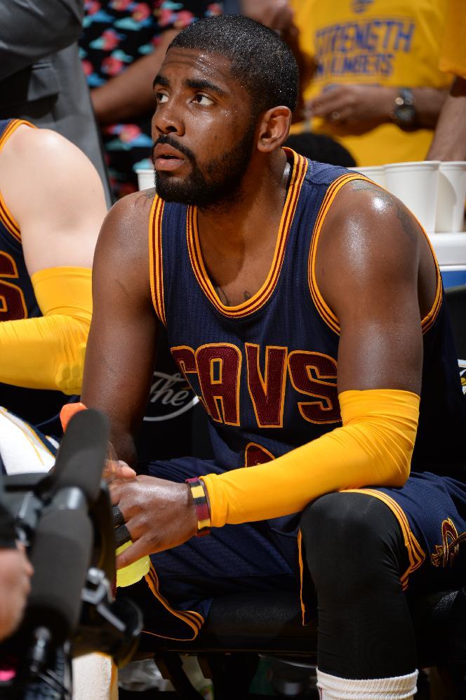 OAKLAND, CA - JUNE 4: Kyrie Irving #2 of the Cleveland Cavaliers sits on the bench during a time-out during Game One of the 2015 NBA Finals on June 4, 2015 at Oracle Arena in Oakland, California. (Photo by Andrew D. Bernstein/NBAE via Getty Images)