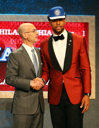 NEW YORK, NY - JUNE 25: Jahlil Okafor meets with Commissioner Adam Silver after being selected third overall by the Philadelphia 76ers in the First Round of the 2015 NBA Draft at the Barclays Center on June 25, 2015 in the Brooklyn borough of New York City. (Photo by Elsa/Getty Images)